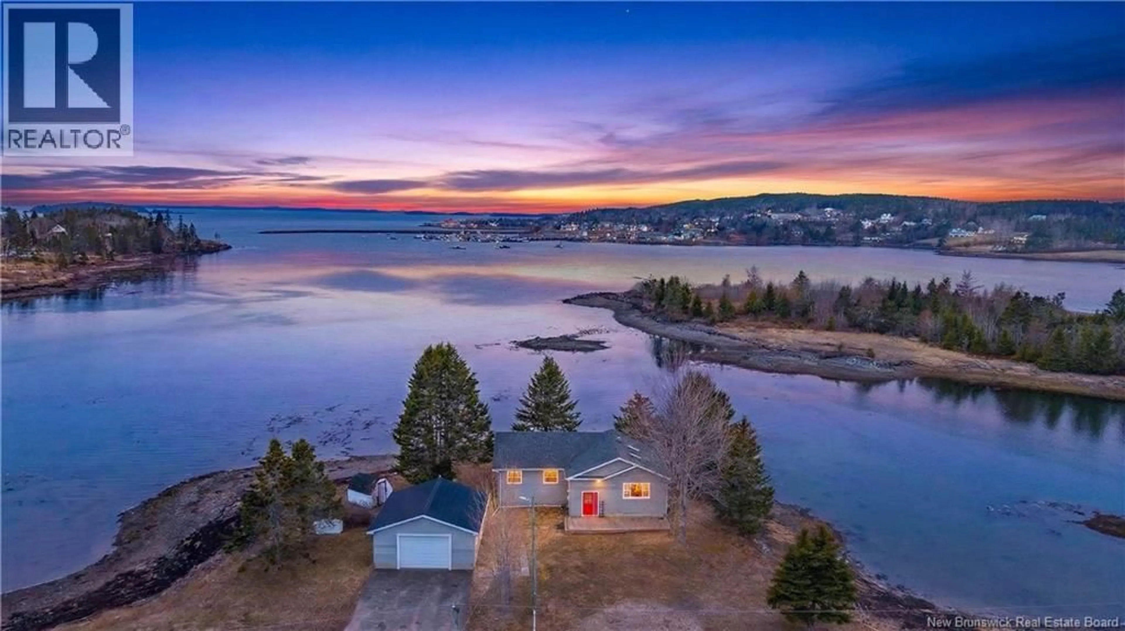 A pic from outside/outdoor area/front of a property/back of a property/a pic from drone, water/lake/river/ocean view for 58 LEAVITT HEAD ROAD, Back Bay New Brunswick E5C1Z7
