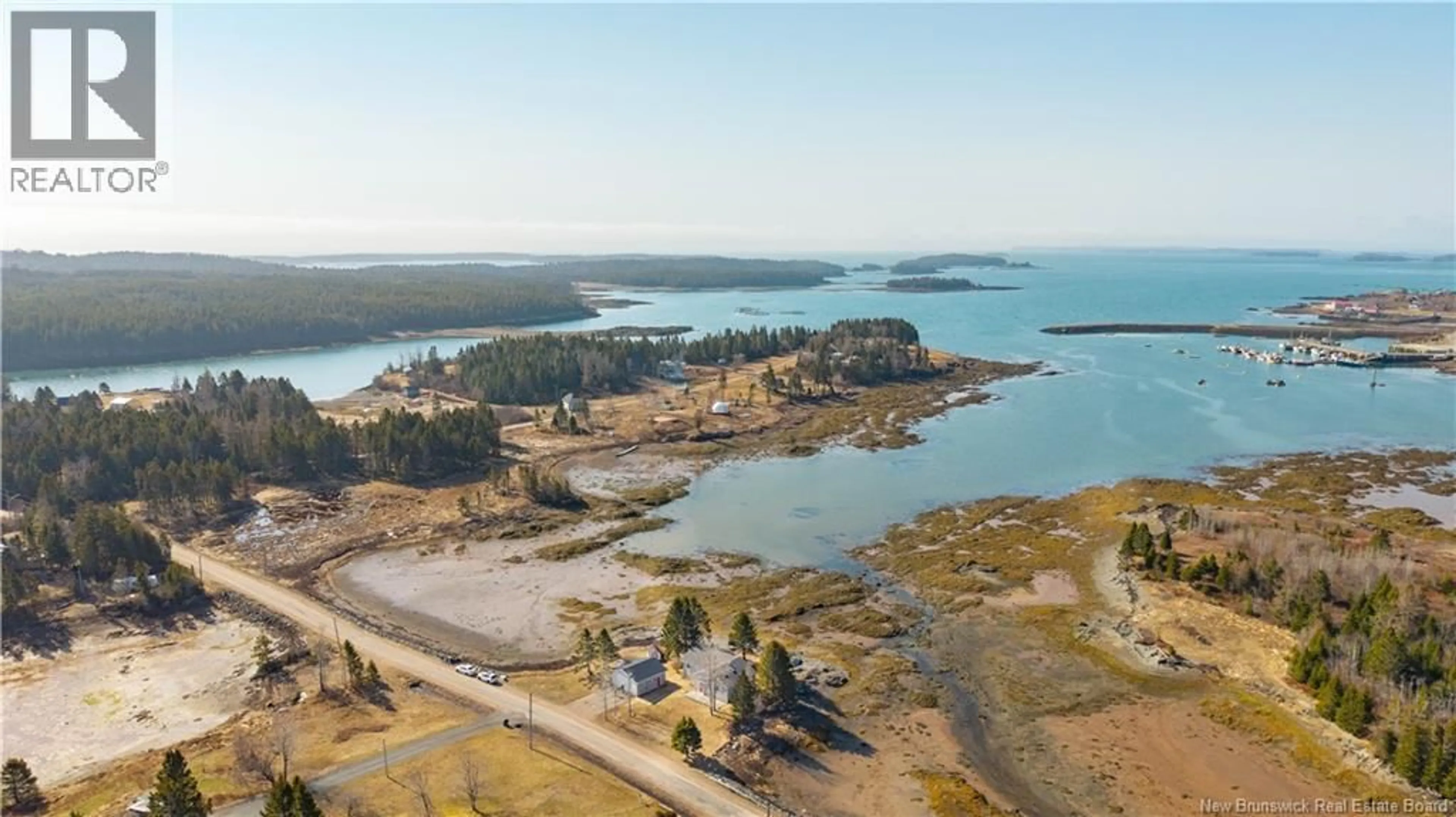 A pic from outside/outdoor area/front of a property/back of a property/a pic from drone, water/lake/river/ocean view for 58 LEAVITT HEAD ROAD, Back Bay New Brunswick E5C1Z7