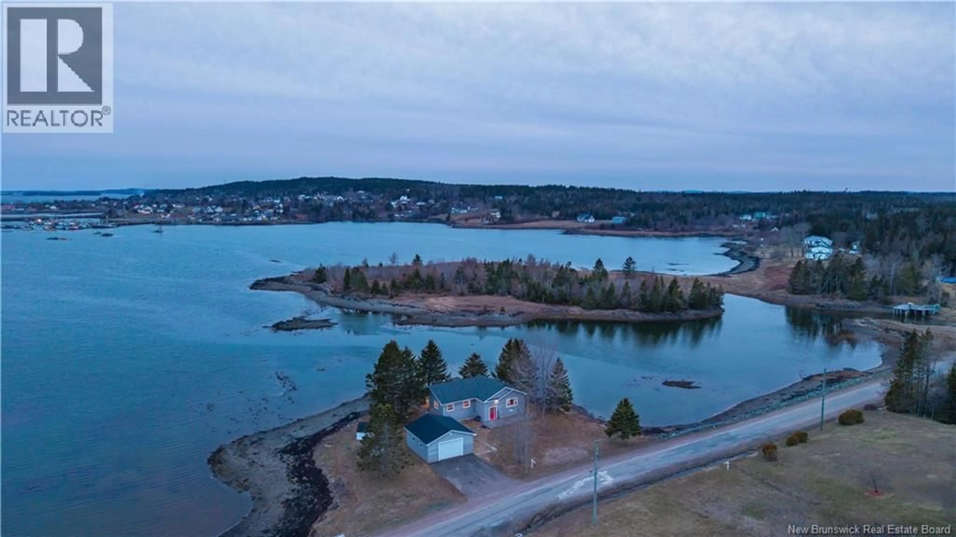 A pic from outside/outdoor area/front of a property/back of a property/a pic from drone, water/lake/river/ocean view for 58 LEAVITT HEAD ROAD, Back Bay New Brunswick E5C1Z7