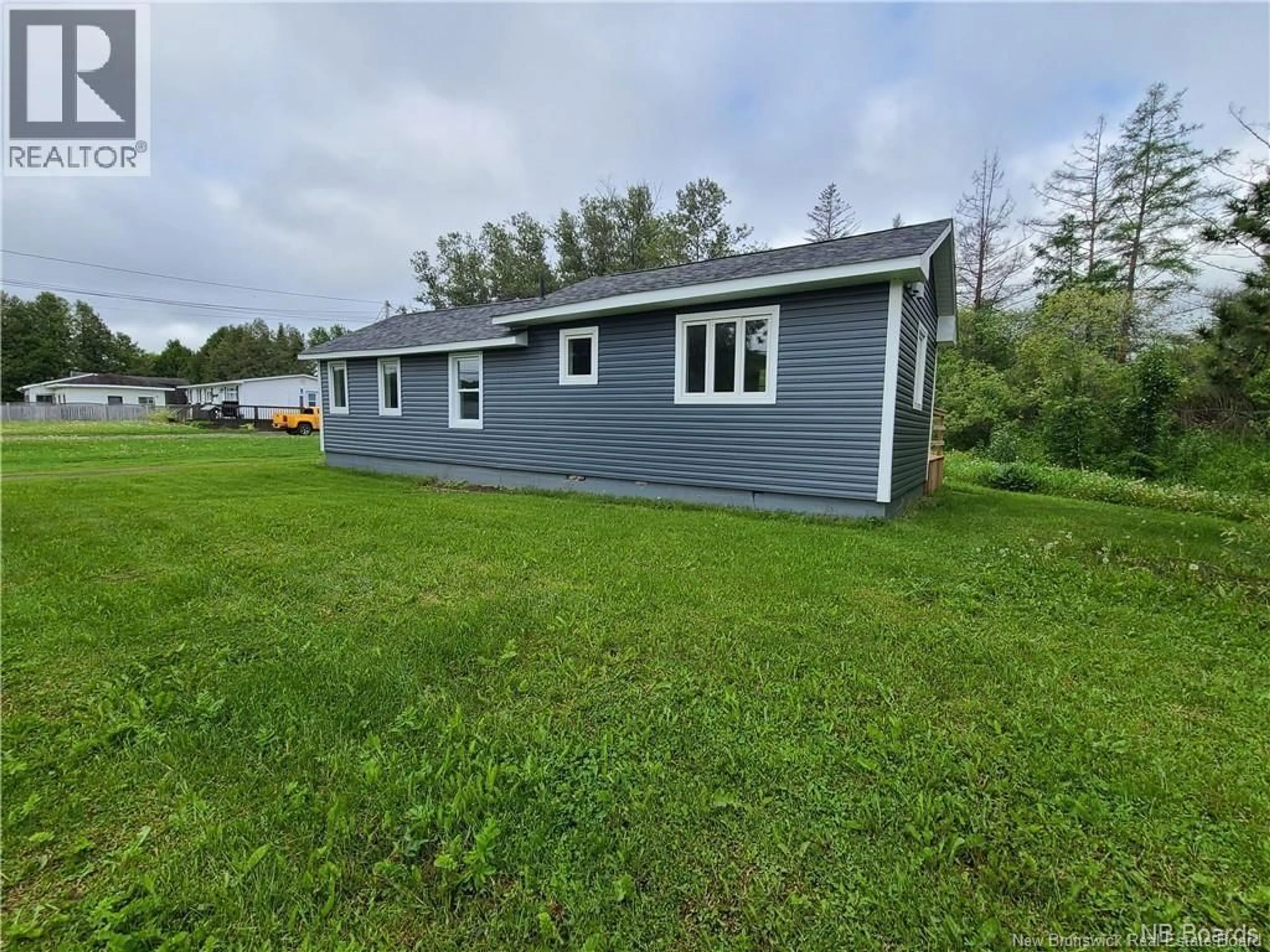 A pic from outside/outdoor area/front of a property/back of a property/a pic from drone, building for 317 MAIN STREET, Aroostook New Brunswick E3Z2G2