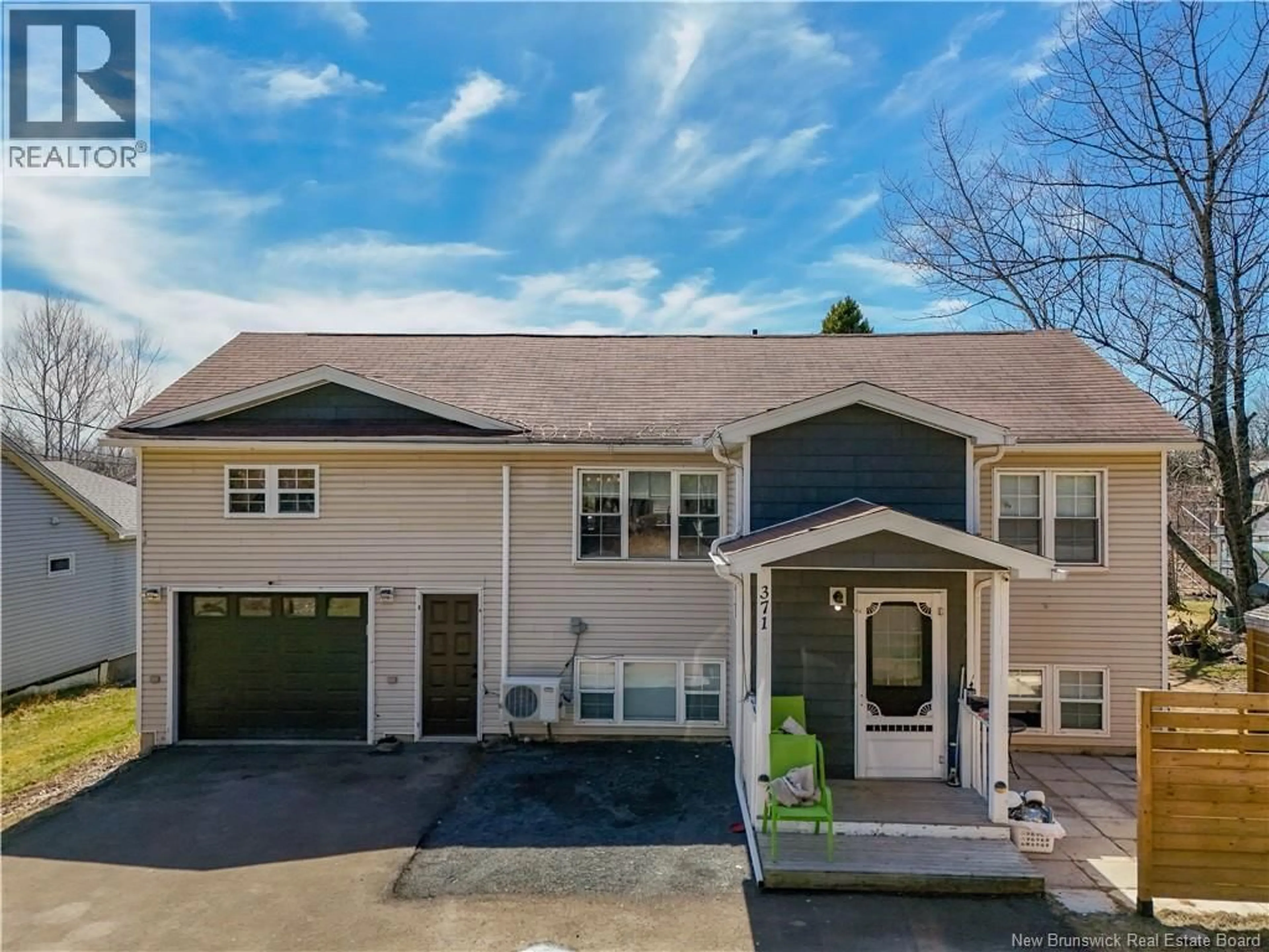 Home with vinyl exterior material, street for 371 ROYAL ROAD, Fredericton New Brunswick E3G6M1