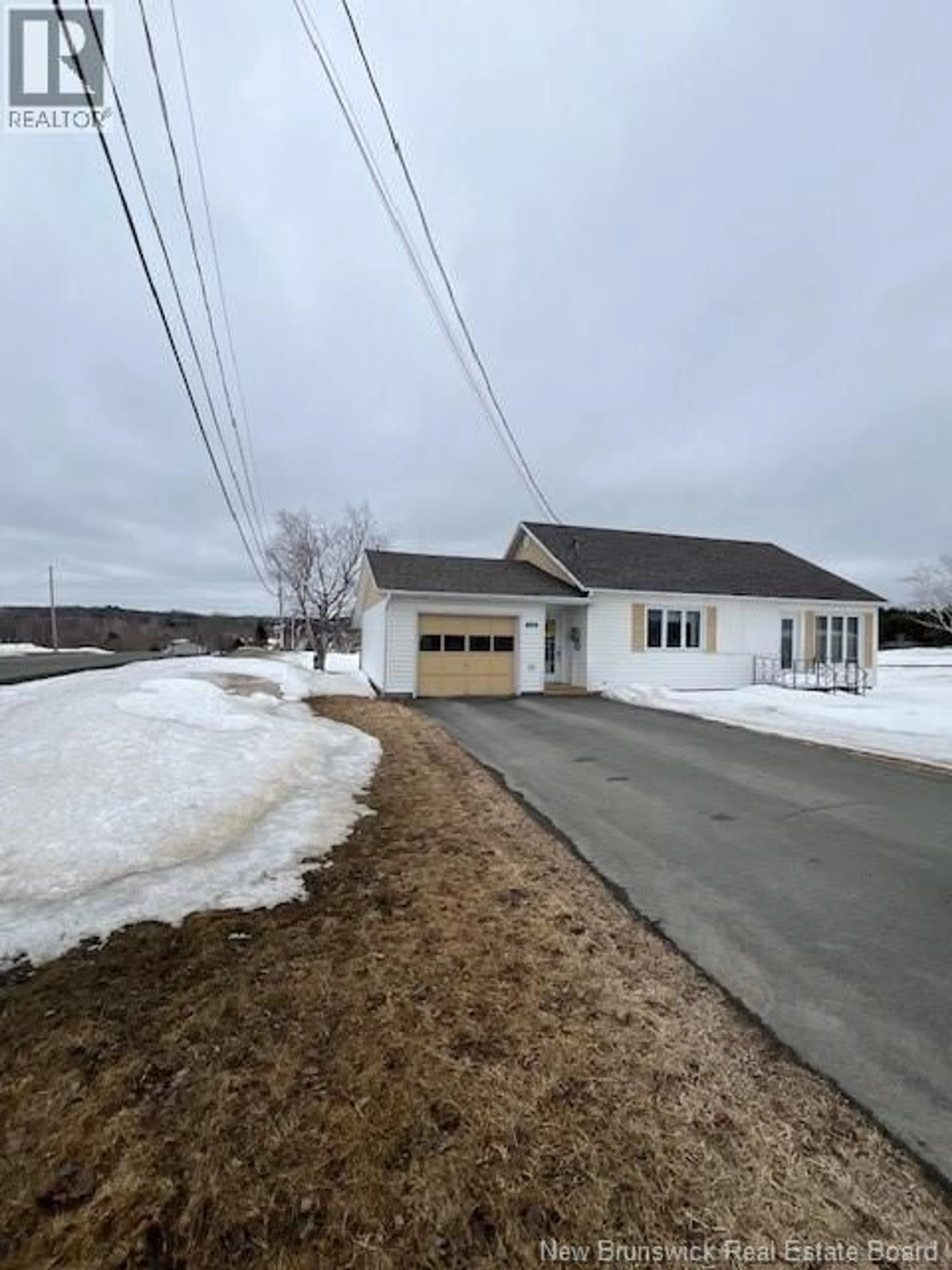 A pic from outside/outdoor area/front of a property/back of a property/a pic from drone, street for 1120 DES PIONNIERS AVENUE, Balmoral New Brunswick E8E1B5