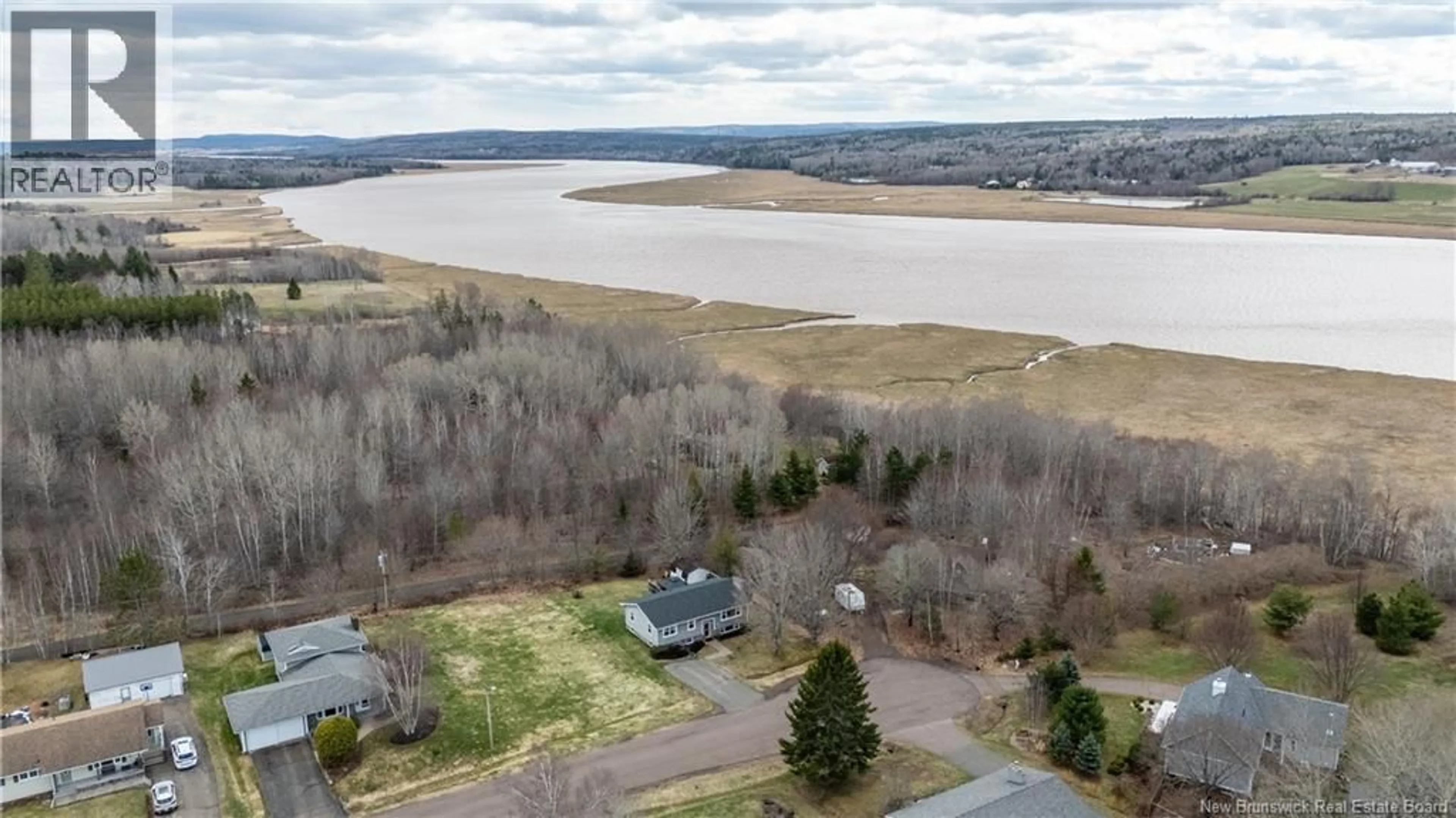 A pic from outside/outdoor area/front of a property/back of a property/a pic from drone, water/lake/river/ocean view for 353 BAYVIEW COURT, Dieppe New Brunswick E1A7L1