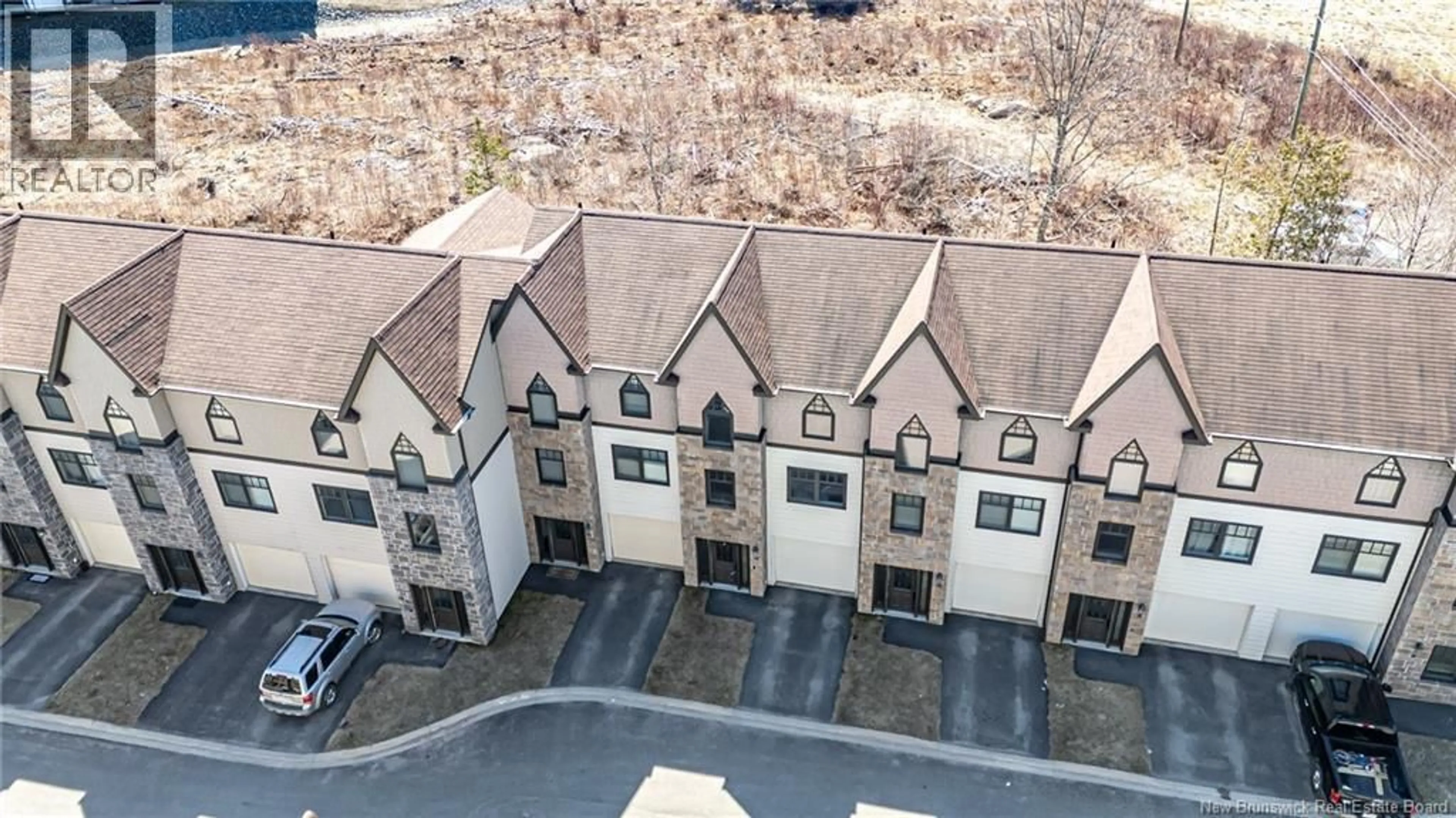 A pic from outside/outdoor area/front of a property/back of a property/a pic from drone, unknown for 16 BROWNSTONE LANE, Fredericton New Brunswick E3A9G3