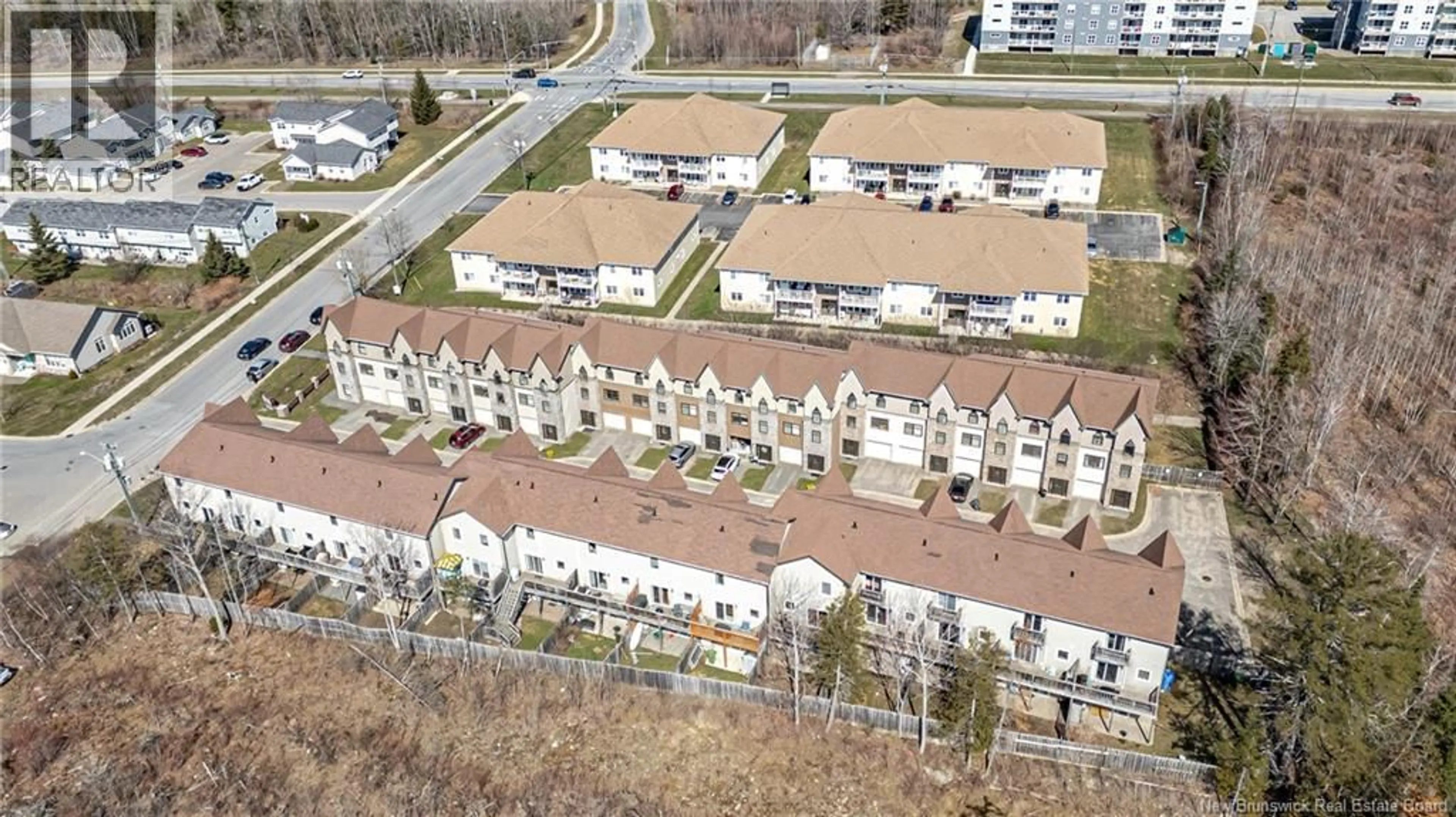 A pic from outside/outdoor area/front of a property/back of a property/a pic from drone, street for 16 BROWNSTONE LANE, Fredericton New Brunswick E3A9G3