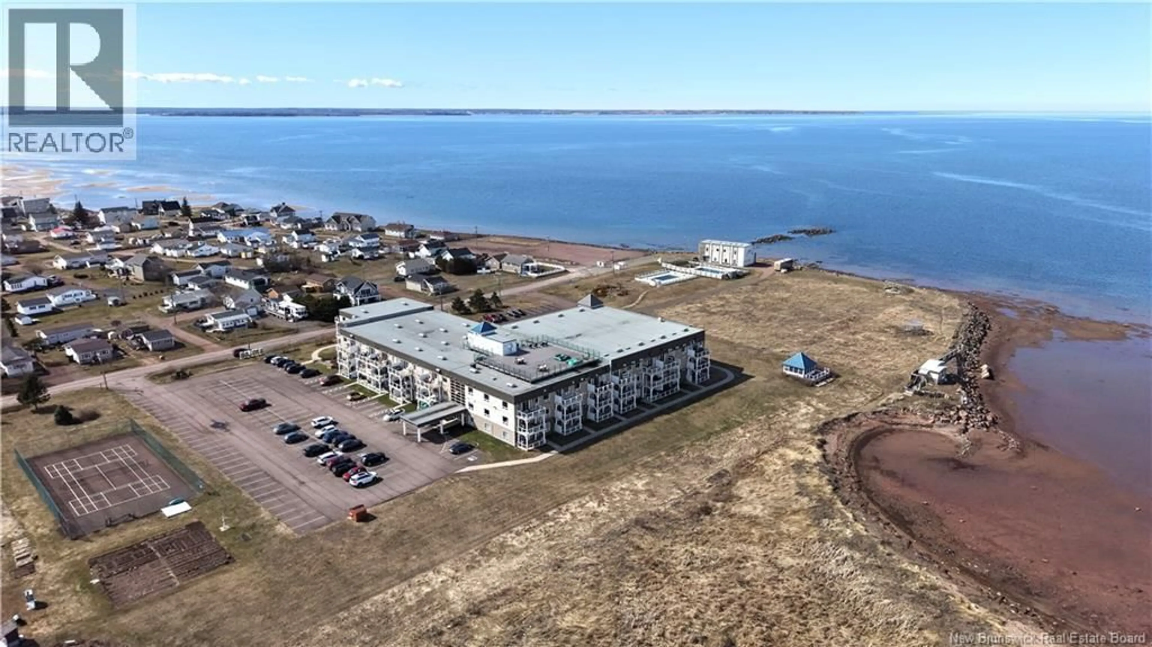 A pic from outside/outdoor area/front of a property/back of a property/a pic from drone, water/lake/river/ocean view for 304 - 69 CAP BIMET BOULEVARD, Grand-Barachois New Brunswick E4P6X5