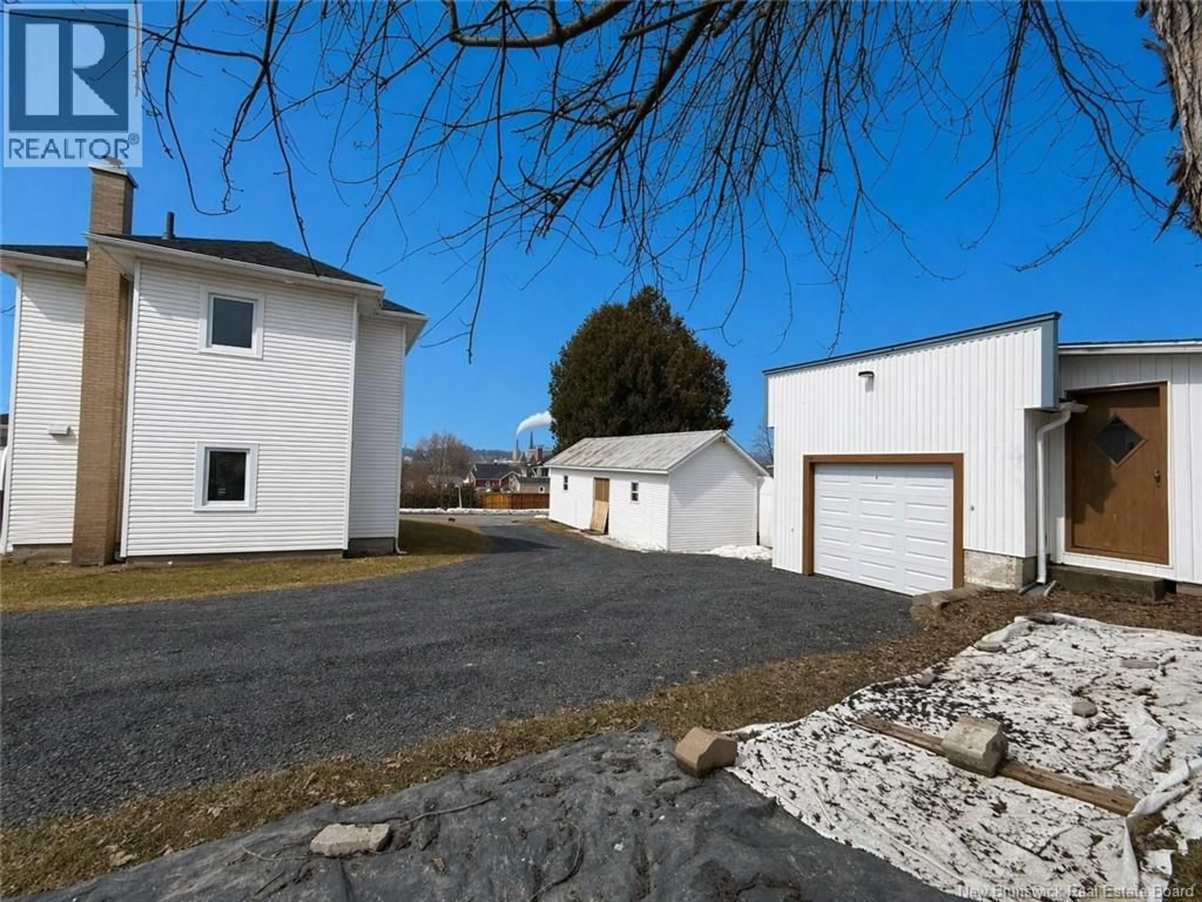 A pic from outside/outdoor area/front of a property/back of a property/a pic from drone, street for 90 35E AVENUE, Edmundston New Brunswick E3V2V3