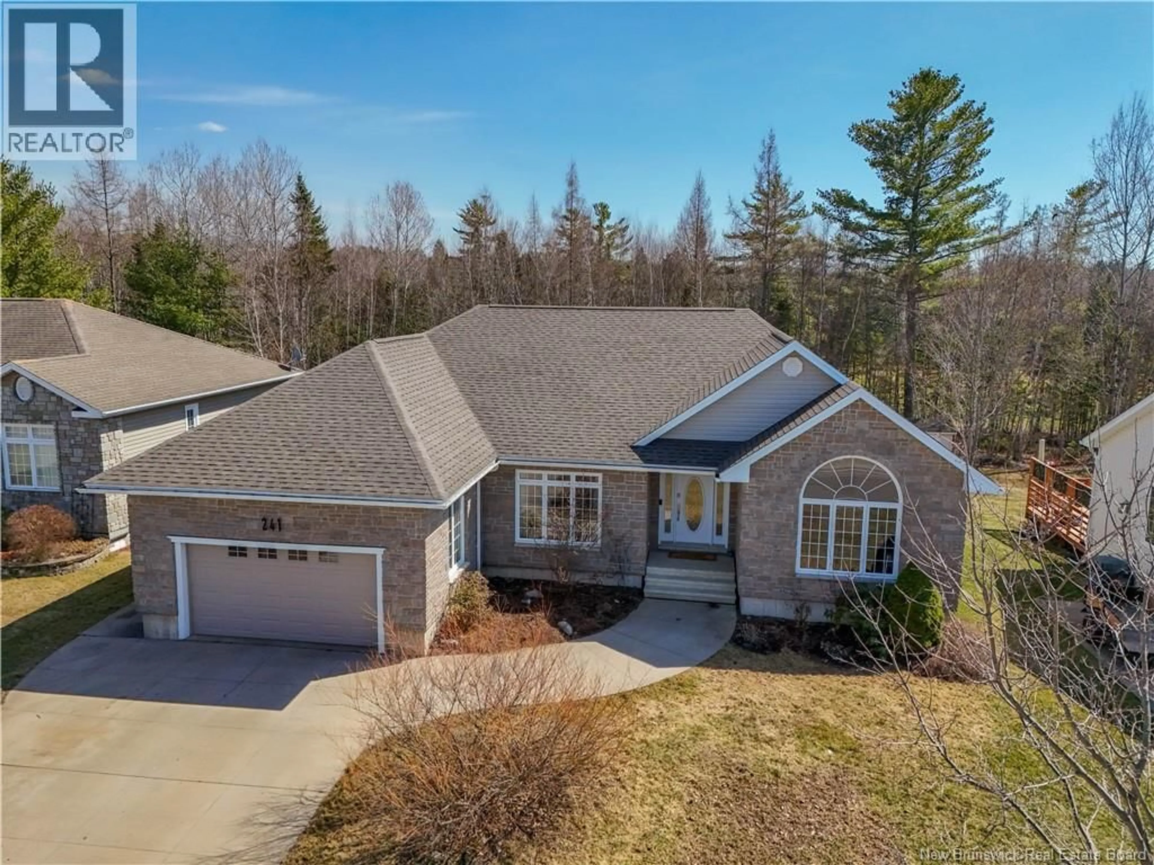 A pic from outside/outdoor area/front of a property/back of a property/a pic from drone, unknown for 241 SUMMERHILL ROW, Fredericton New Brunswick E3G0C5