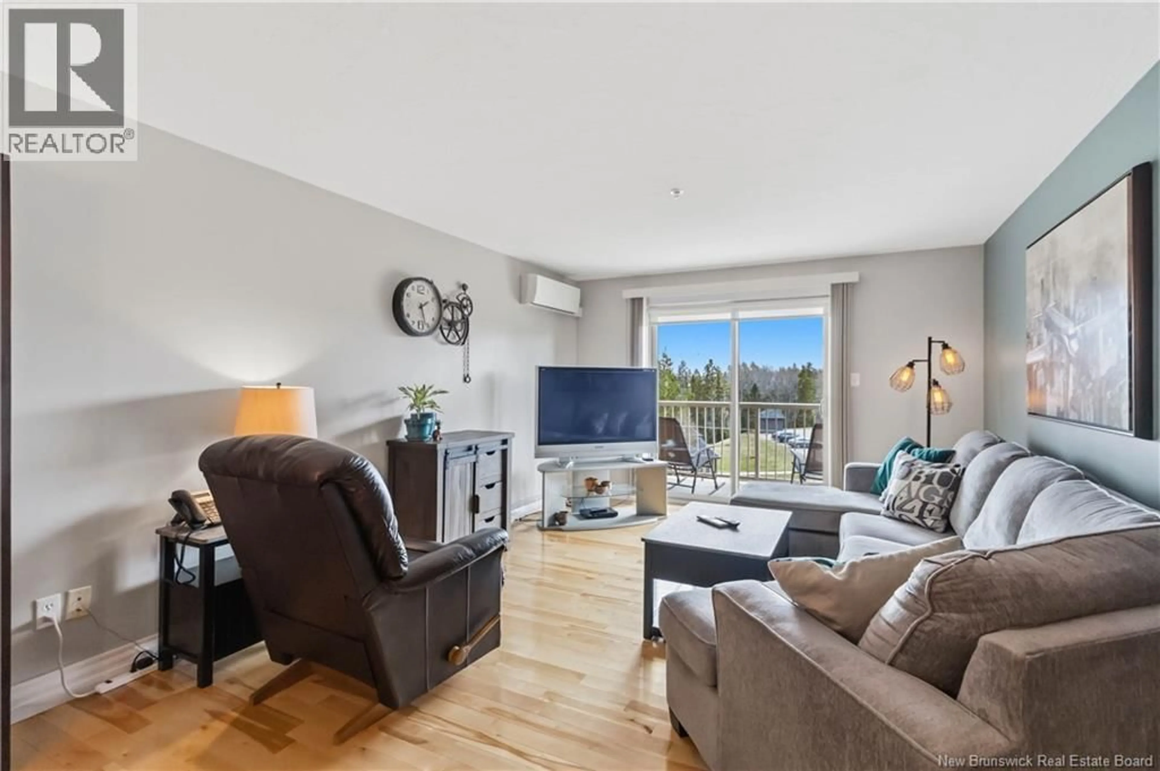 Living room with furniture, unknown for 407 - 65 DIAMOND HEAD COURT, Moncton New Brunswick E1G0V6