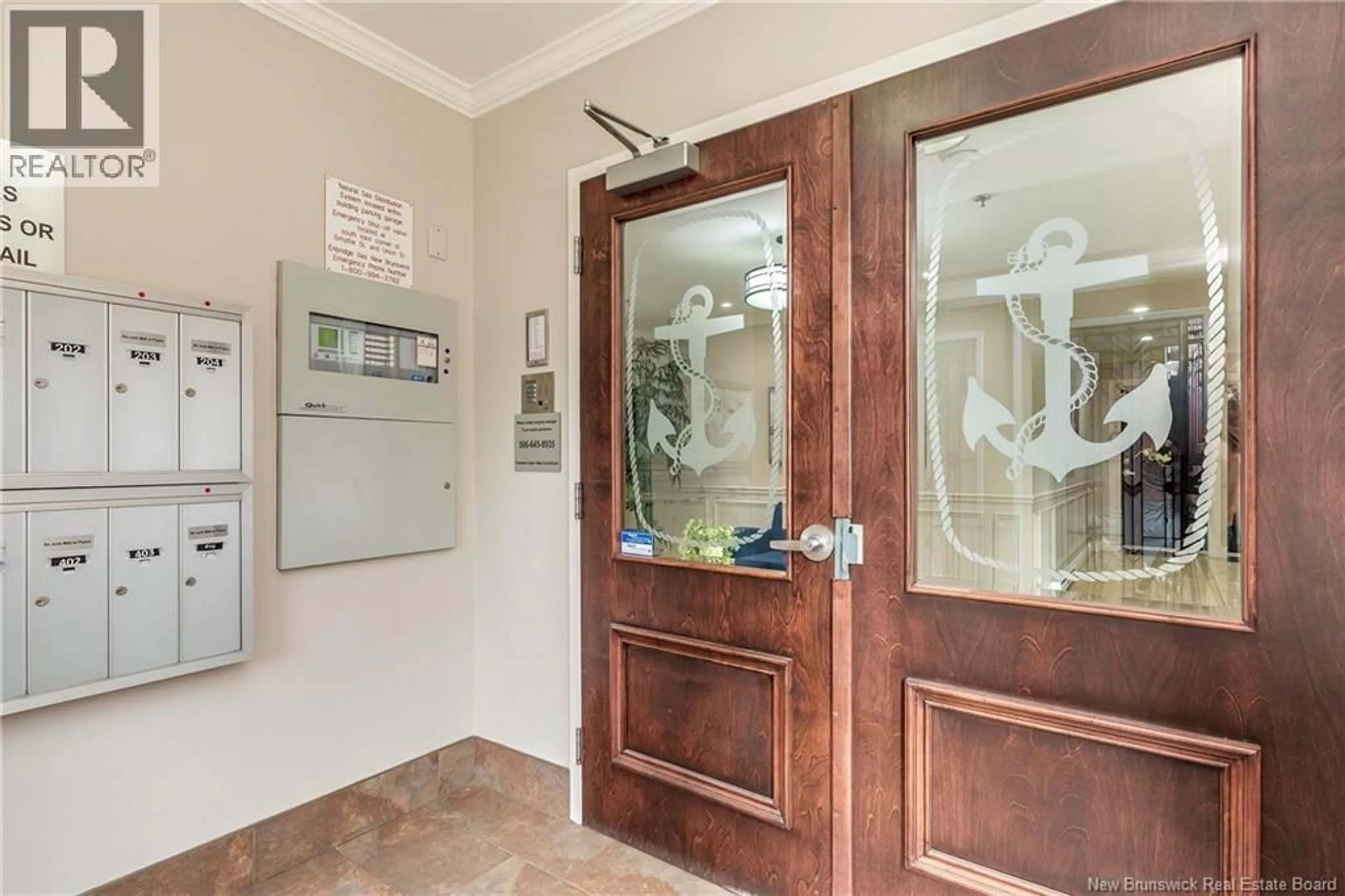 Indoor foyer for 101 - 65 SMYTHE STREET, Saint John New Brunswick E2L0A1