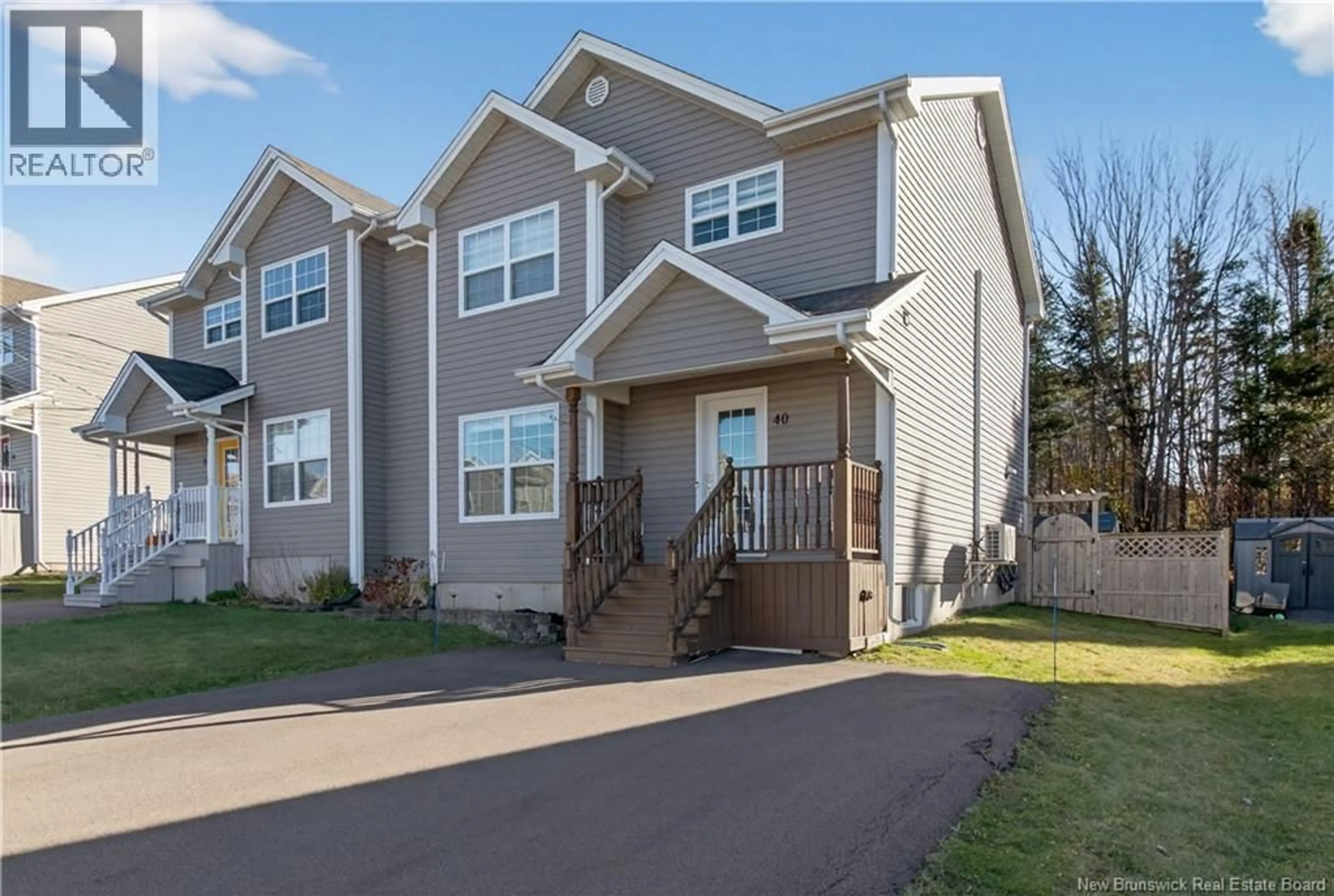 Home with vinyl exterior material, street for 40 CHIANTI, Dieppe New Brunswick E1A9A9