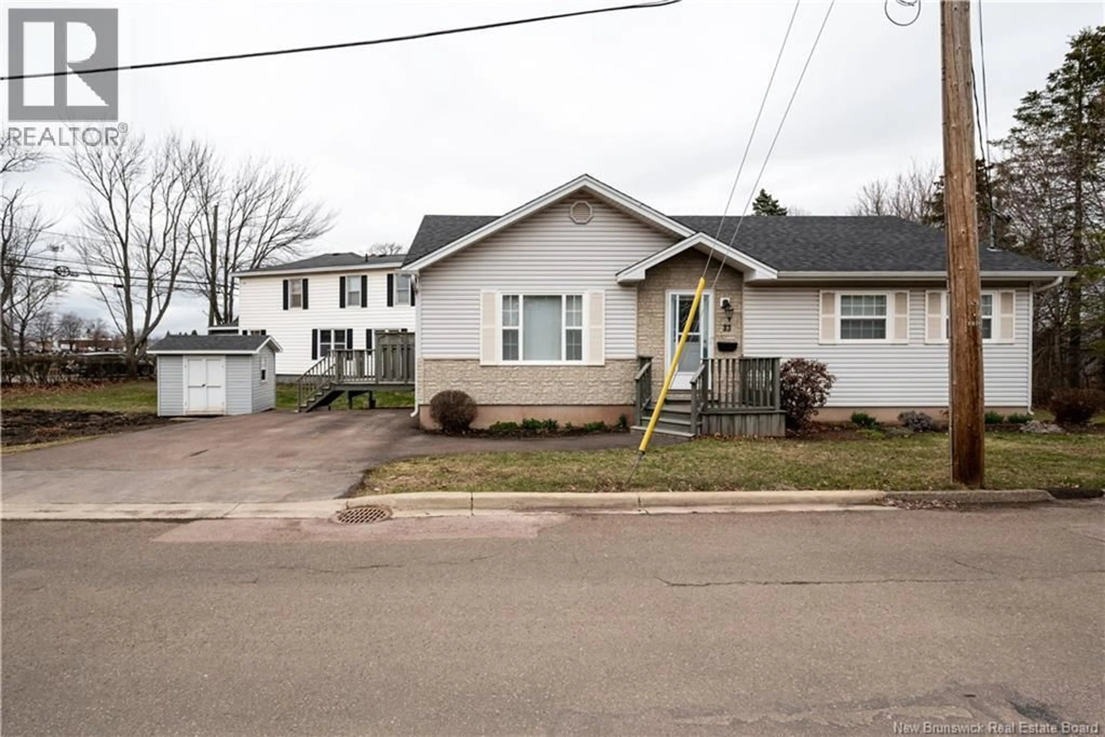 A pic from outside/outdoor area/front of a property/back of a property/a pic from drone, street for 33 REILLY AVENUE, Moncton New Brunswick E1A3H2