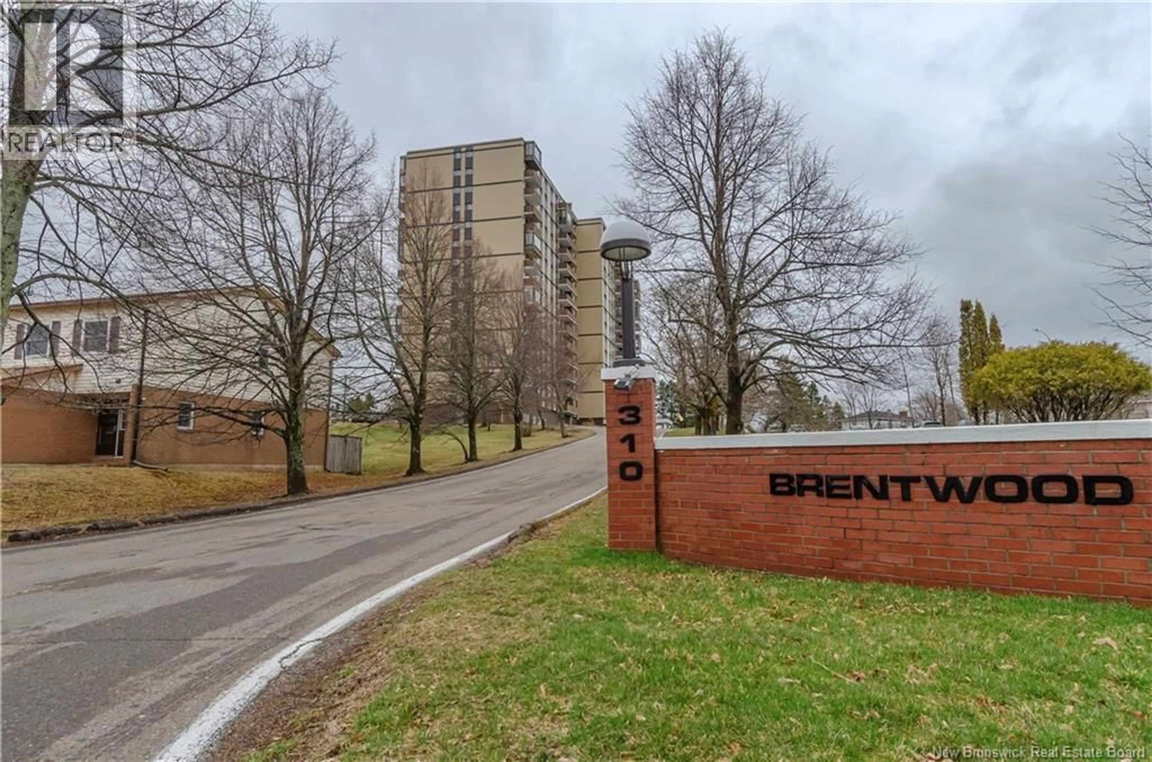 A pic from outside/outdoor area/front of a property/back of a property/a pic from drone, mountain view for 1006 - 310 WOODWARD AVENUE, Saint John New Brunswick E2K2L1