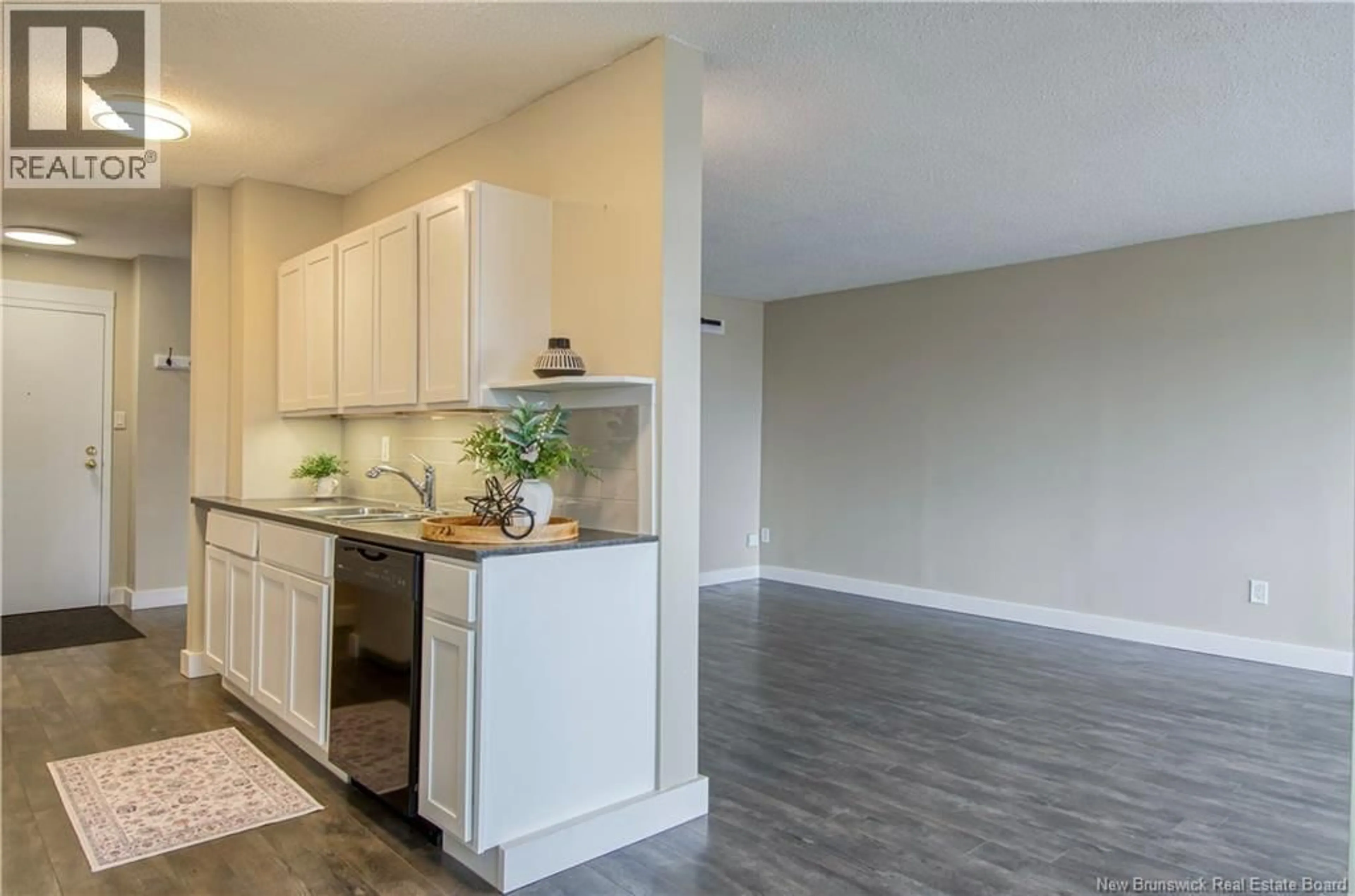 Open concept kitchen, wood/laminate floor for 1006 - 310 WOODWARD AVENUE, Saint John New Brunswick E2K2L1