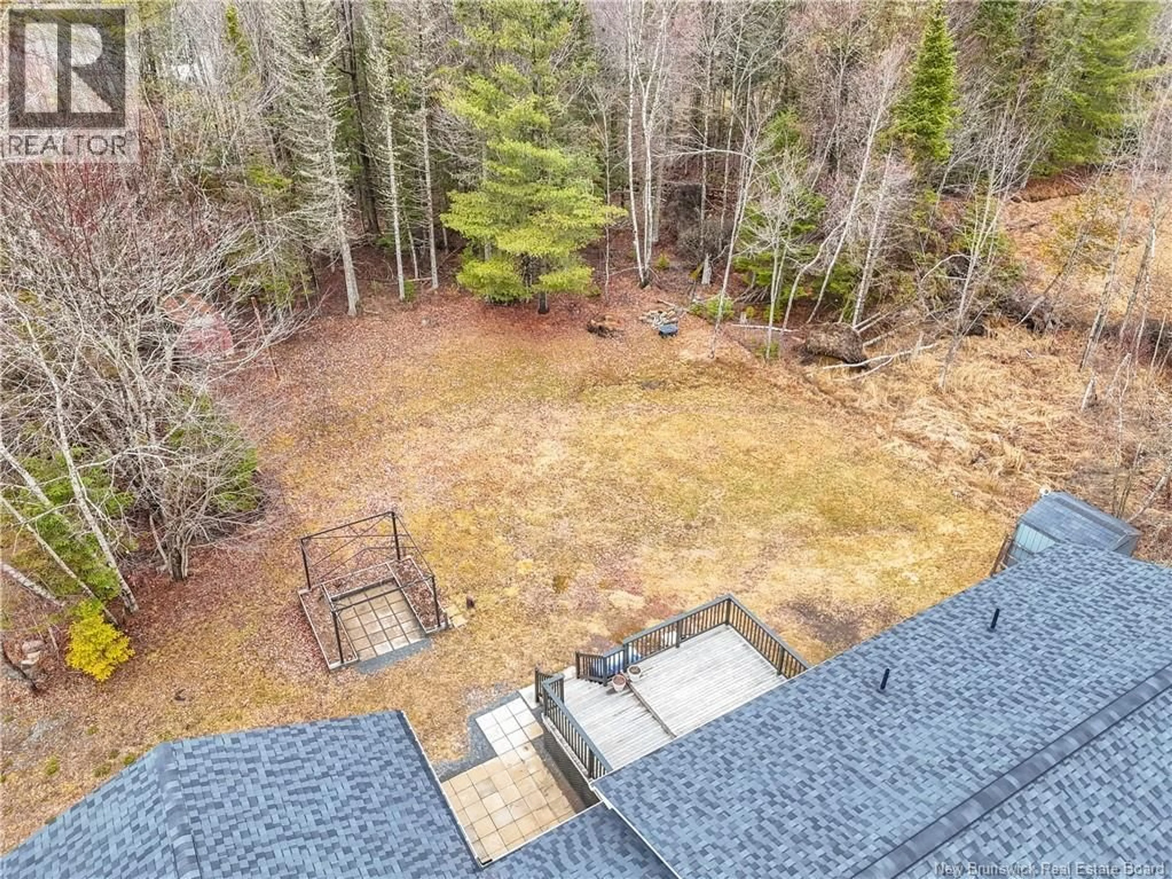 A pic from outside/outdoor area/front of a property/back of a property/a pic from drone, forest/trees view for 25 TANYA DRIVE, Douglas New Brunswick E3G8A5