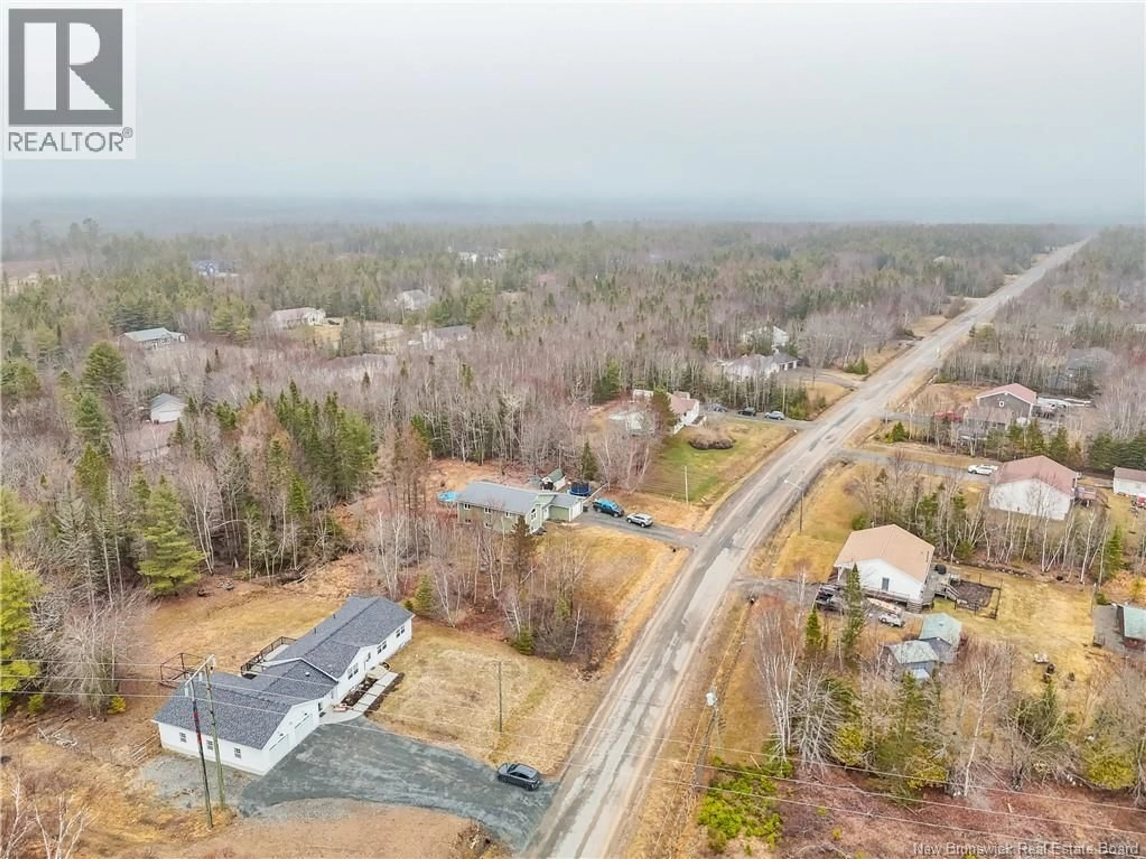 A pic from outside/outdoor area/front of a property/back of a property/a pic from drone, unknown for 25 TANYA DRIVE, Douglas New Brunswick E3G8A5