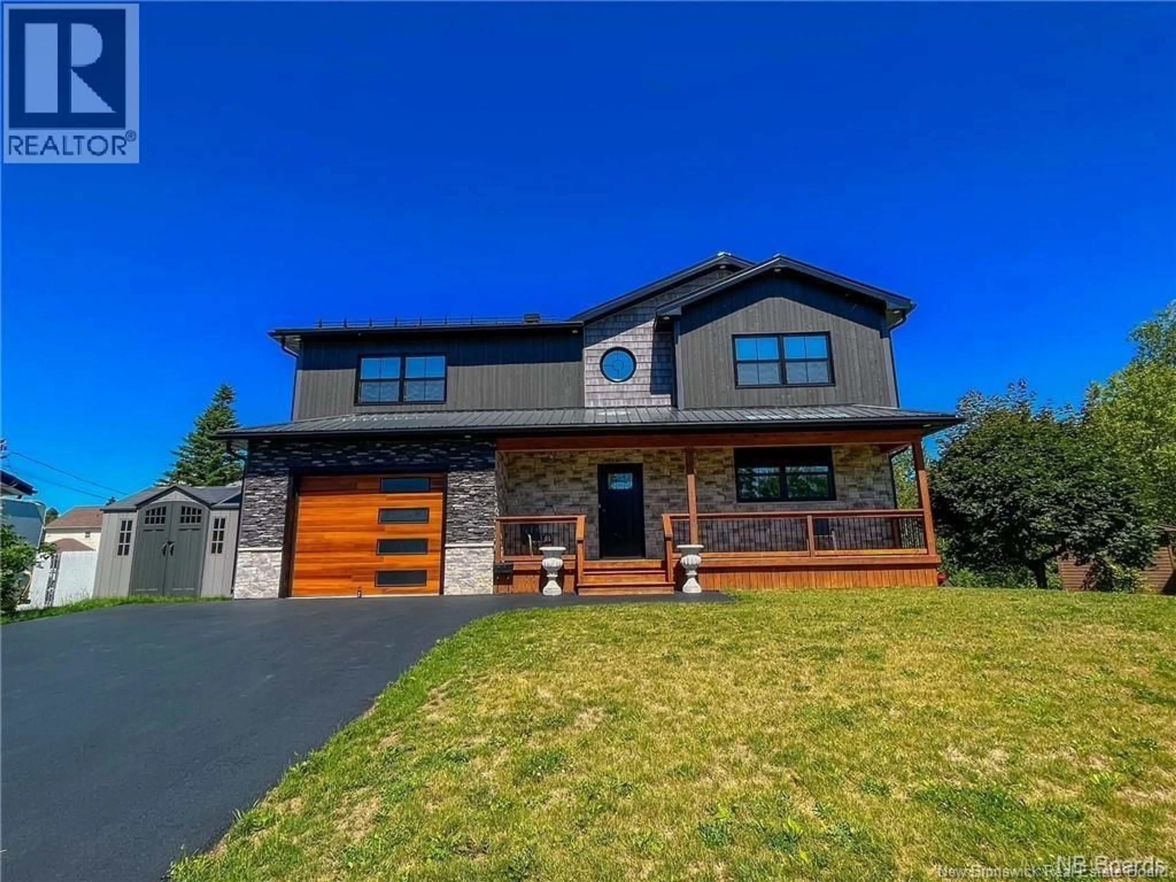 Home with brick exterior material, street for 6 ASPEN, Campbellton New Brunswick E3N3S9