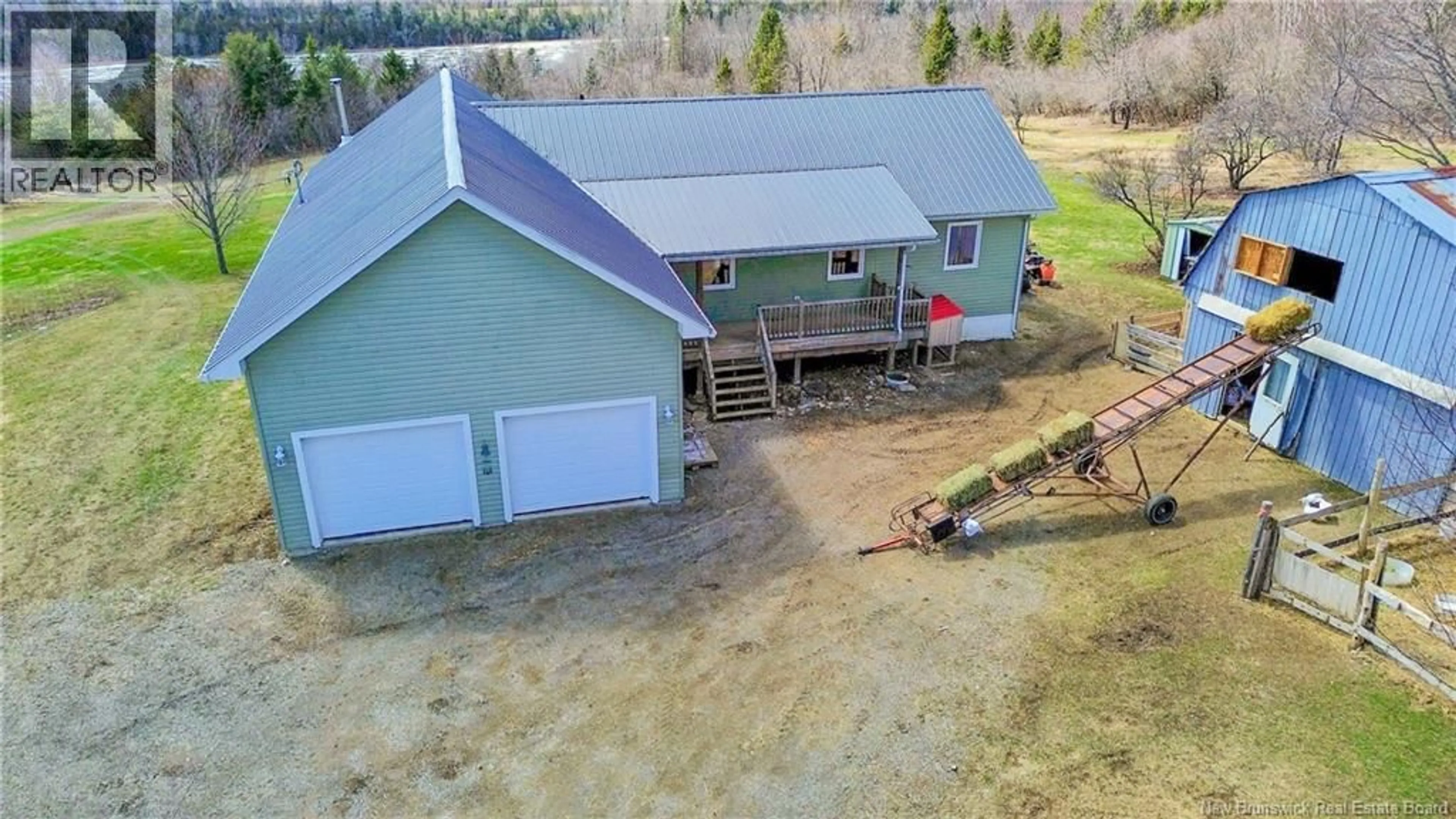 A pic from outside/outdoor area/front of a property/back of a property/a pic from drone, building for 9945 ROUTE 105, Beechwood New Brunswick E7J1V3