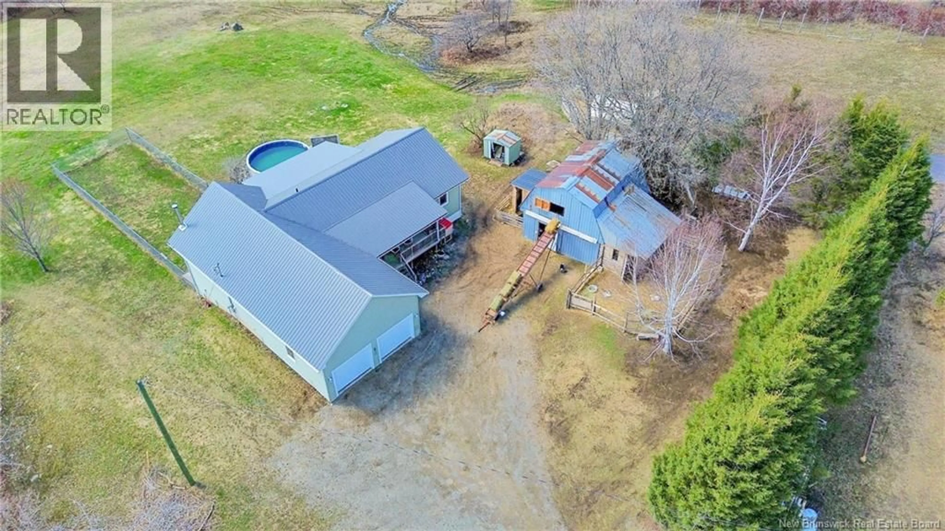 A pic from outside/outdoor area/front of a property/back of a property/a pic from drone, building for 9945 ROUTE 105, Beechwood New Brunswick E7J1V3