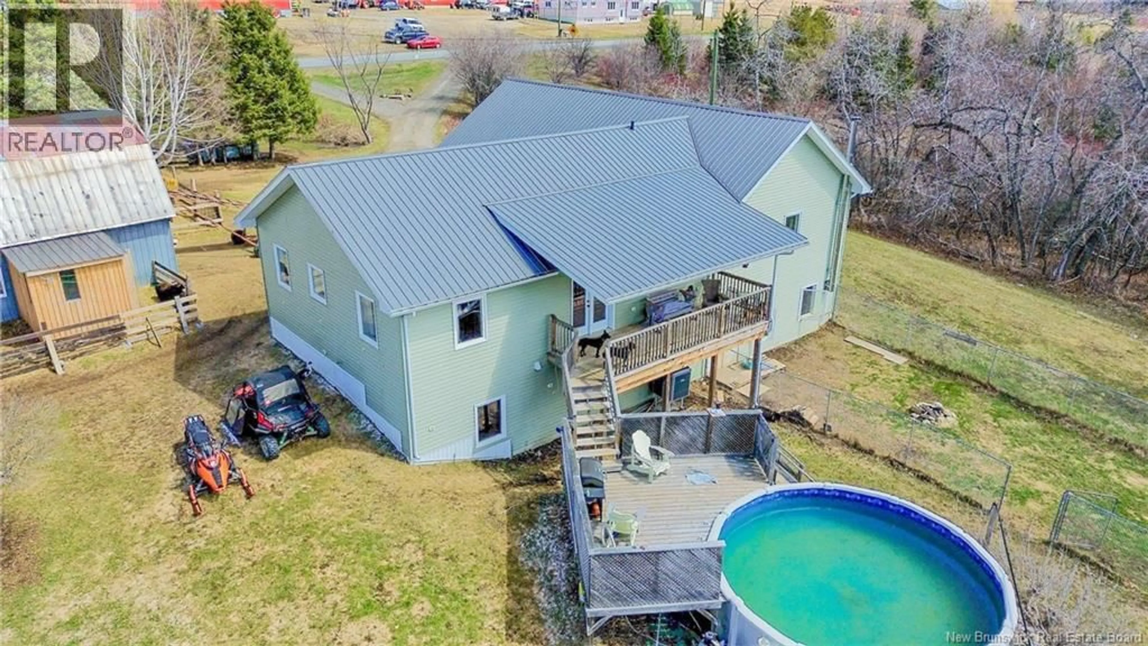A pic from outside/outdoor area/front of a property/back of a property/a pic from drone, unknown for 9945 ROUTE 105, Beechwood New Brunswick E7J1V3
