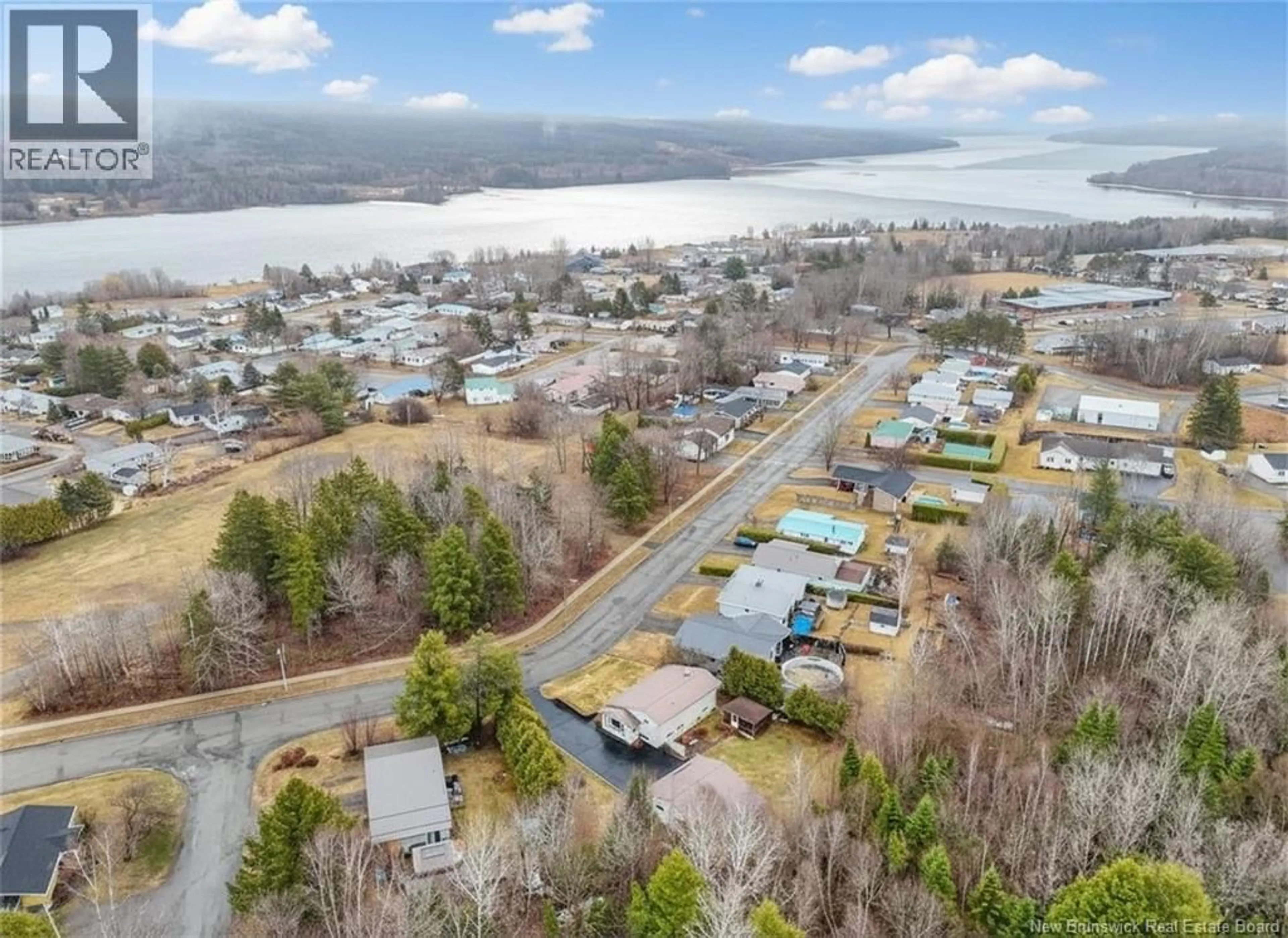 A pic from outside/outdoor area/front of a property/back of a property/a pic from drone, water/lake/river/ocean view for 57 MCNAIR DRIVE, Nackawic New Brunswick E6G1A4
