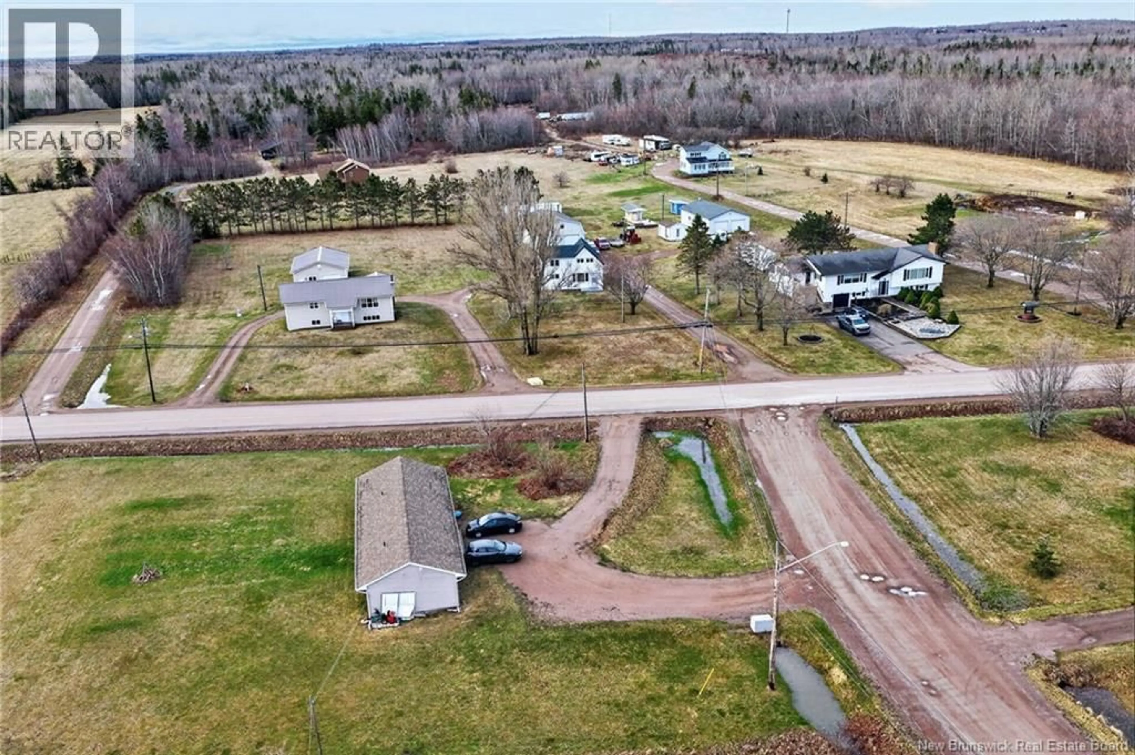 A pic from outside/outdoor area/front of a property/back of a property/a pic from drone, street for 1-3 ALCIDE STREET, Trois Ruisseaux New Brunswick E4N2S9