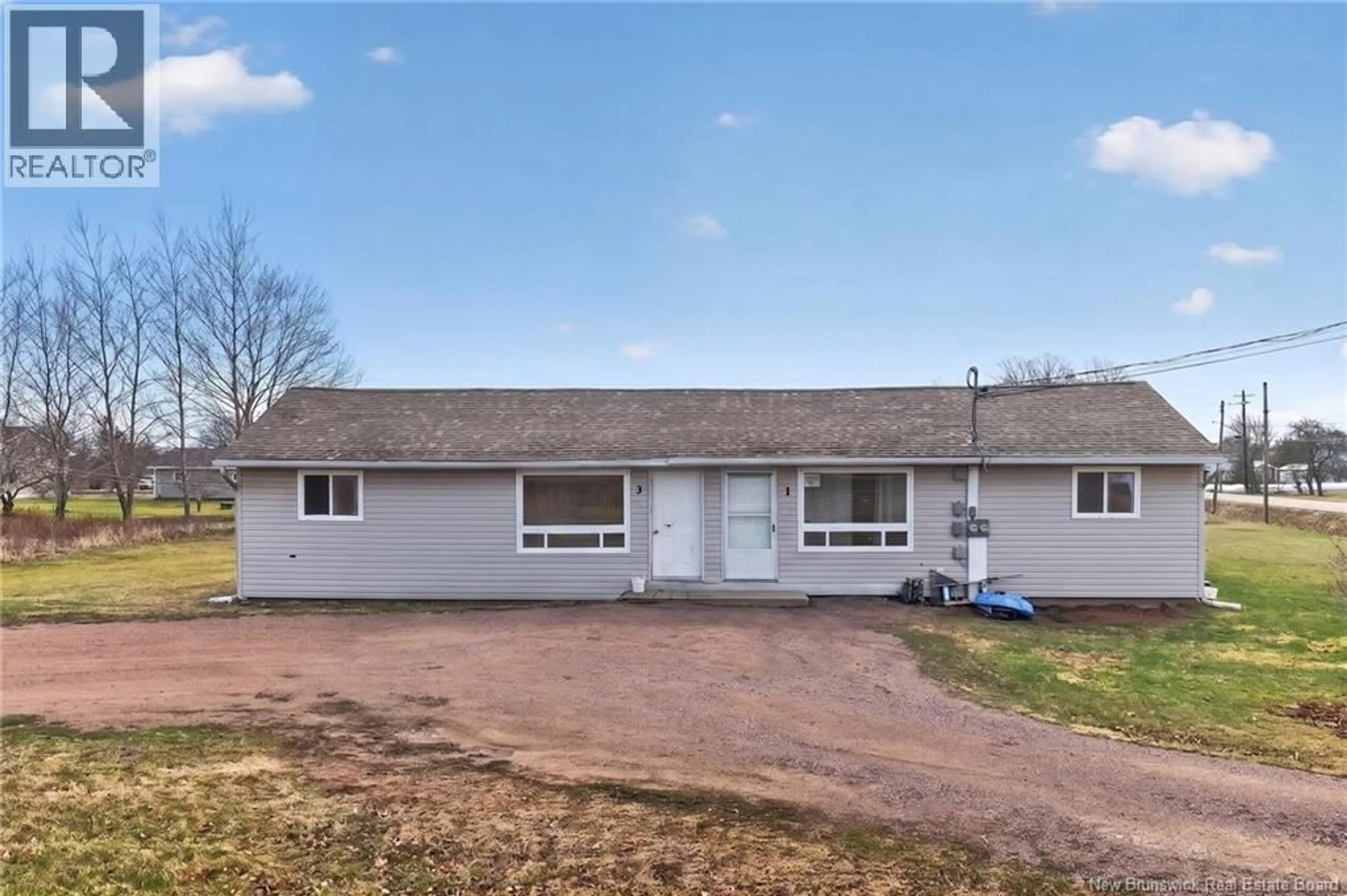 Home with vinyl exterior material, street for 1-3 ALCIDE STREET, Trois Ruisseaux New Brunswick E4N2S9