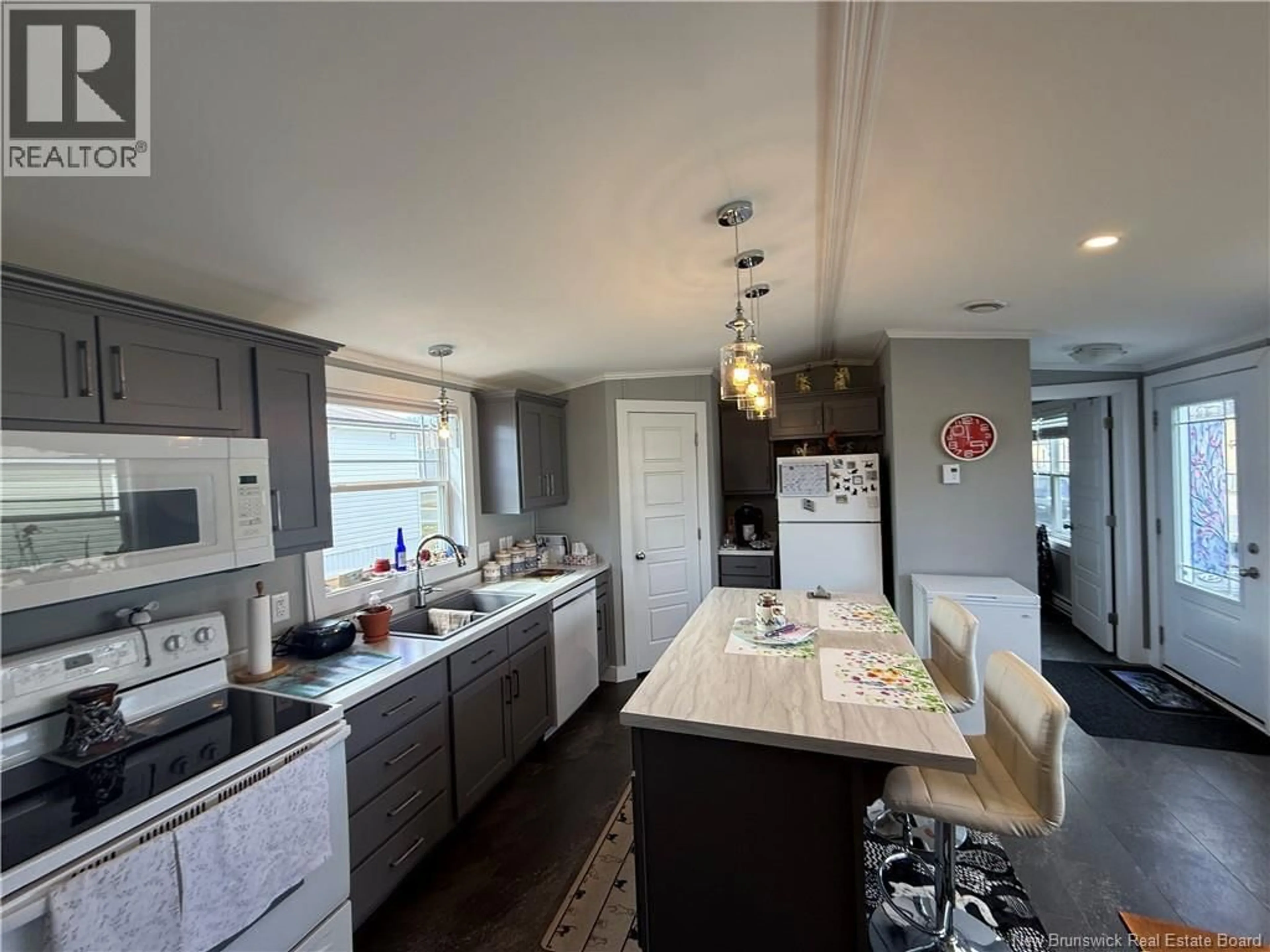 Open concept kitchen, unknown for 11 IVORY COURT, Woodstock New Brunswick E7M0G5