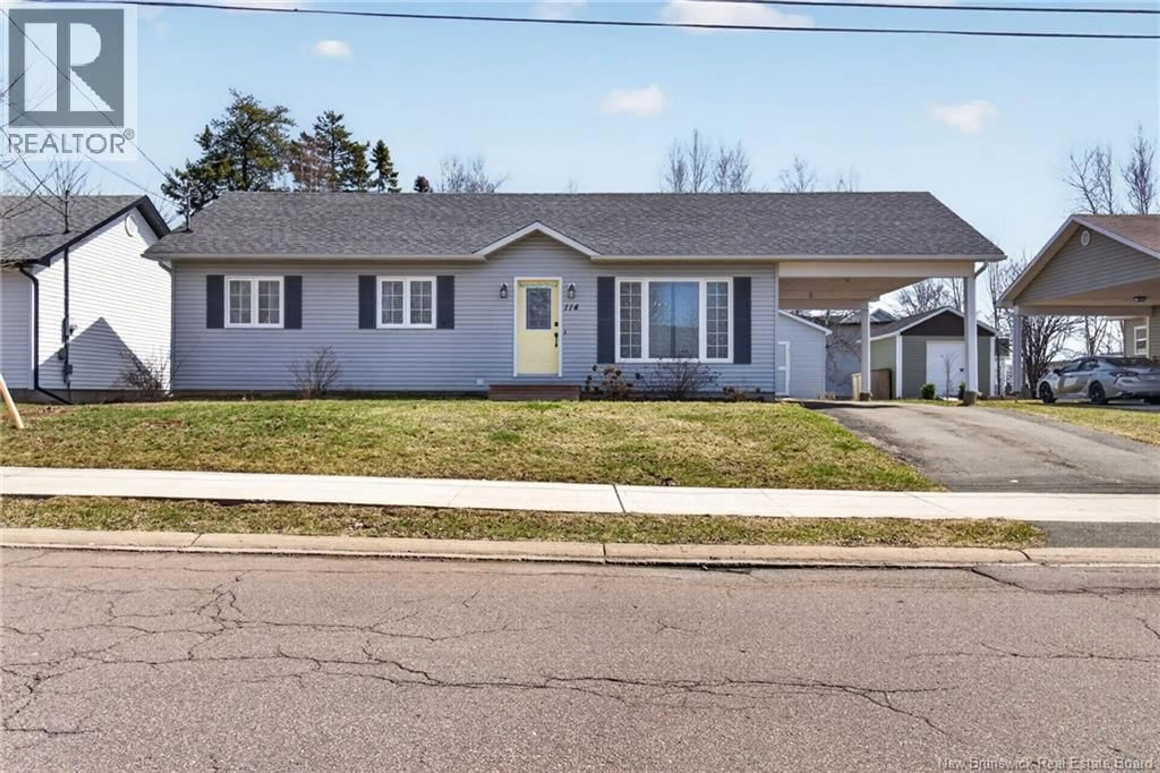 Home with vinyl exterior material, street for 114 DOLBEAU, Dieppe New Brunswick E1A6V6