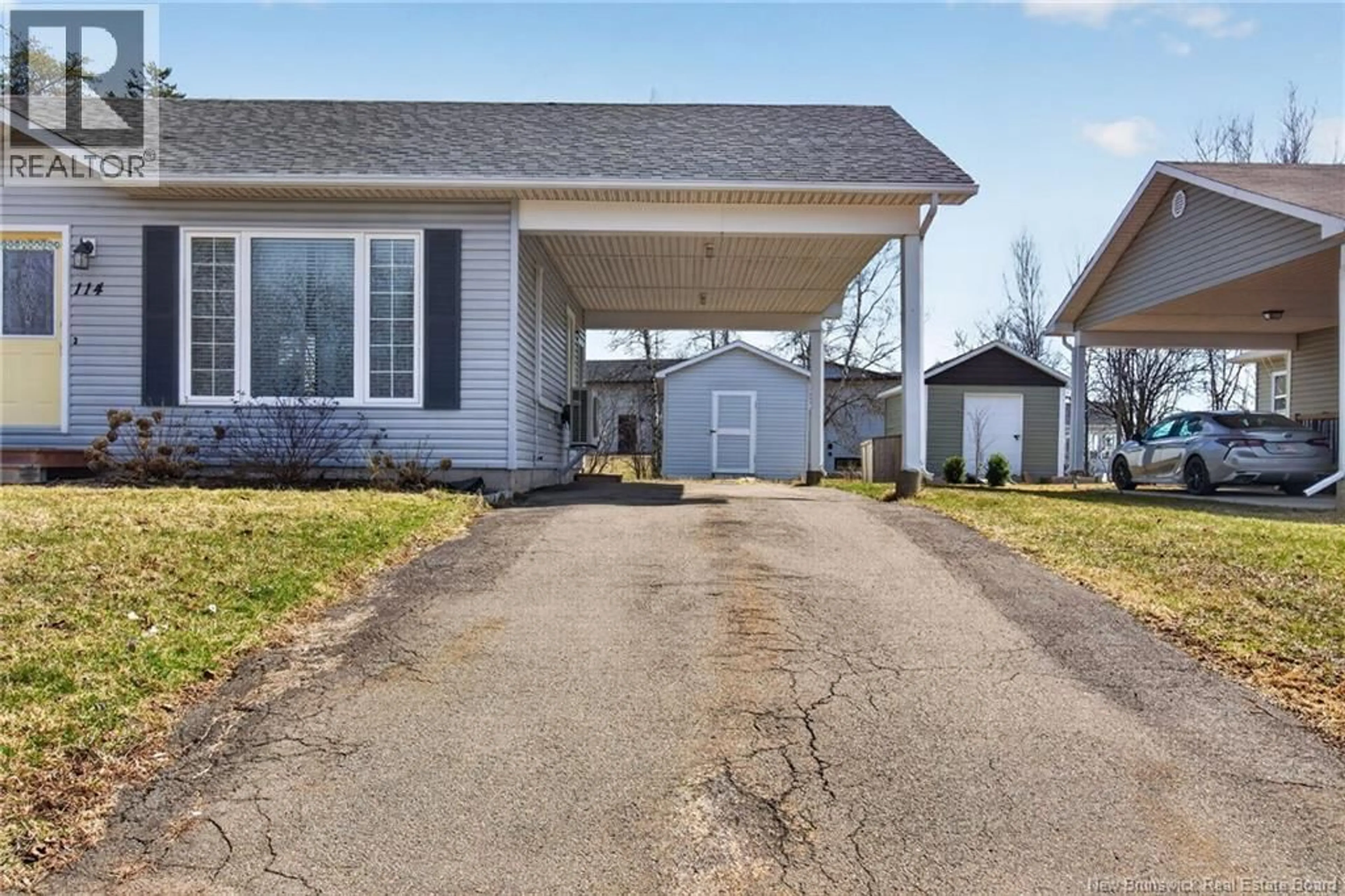 Home with vinyl exterior material, street for 114 DOLBEAU, Dieppe New Brunswick E1A6V6