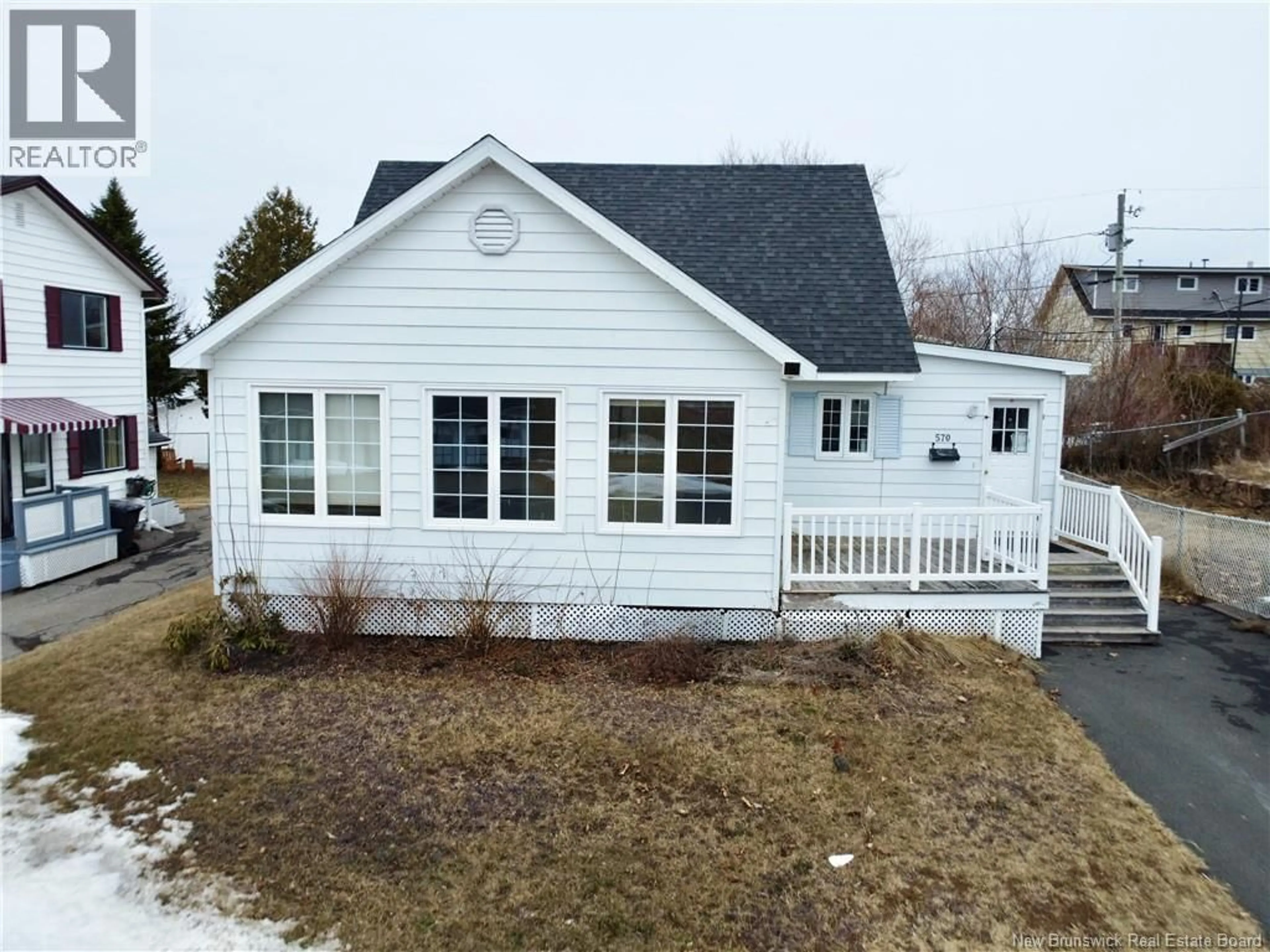 Home with vinyl exterior material, street for 570 STOUT, Bathurst New Brunswick E2A2P3