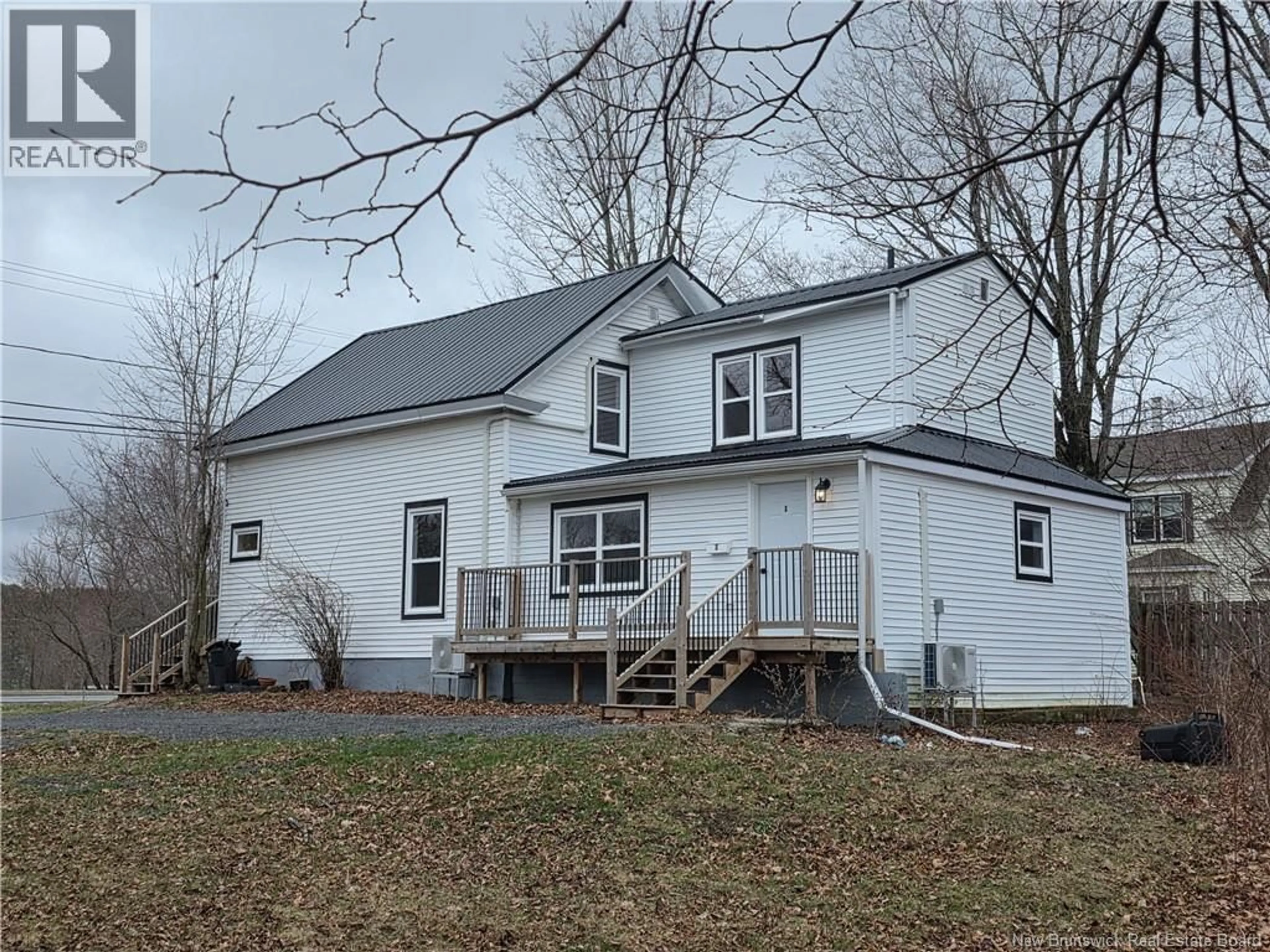 Home with vinyl exterior material, street for 19 CHURCH STREET, St. Stephen New Brunswick E5B1M1