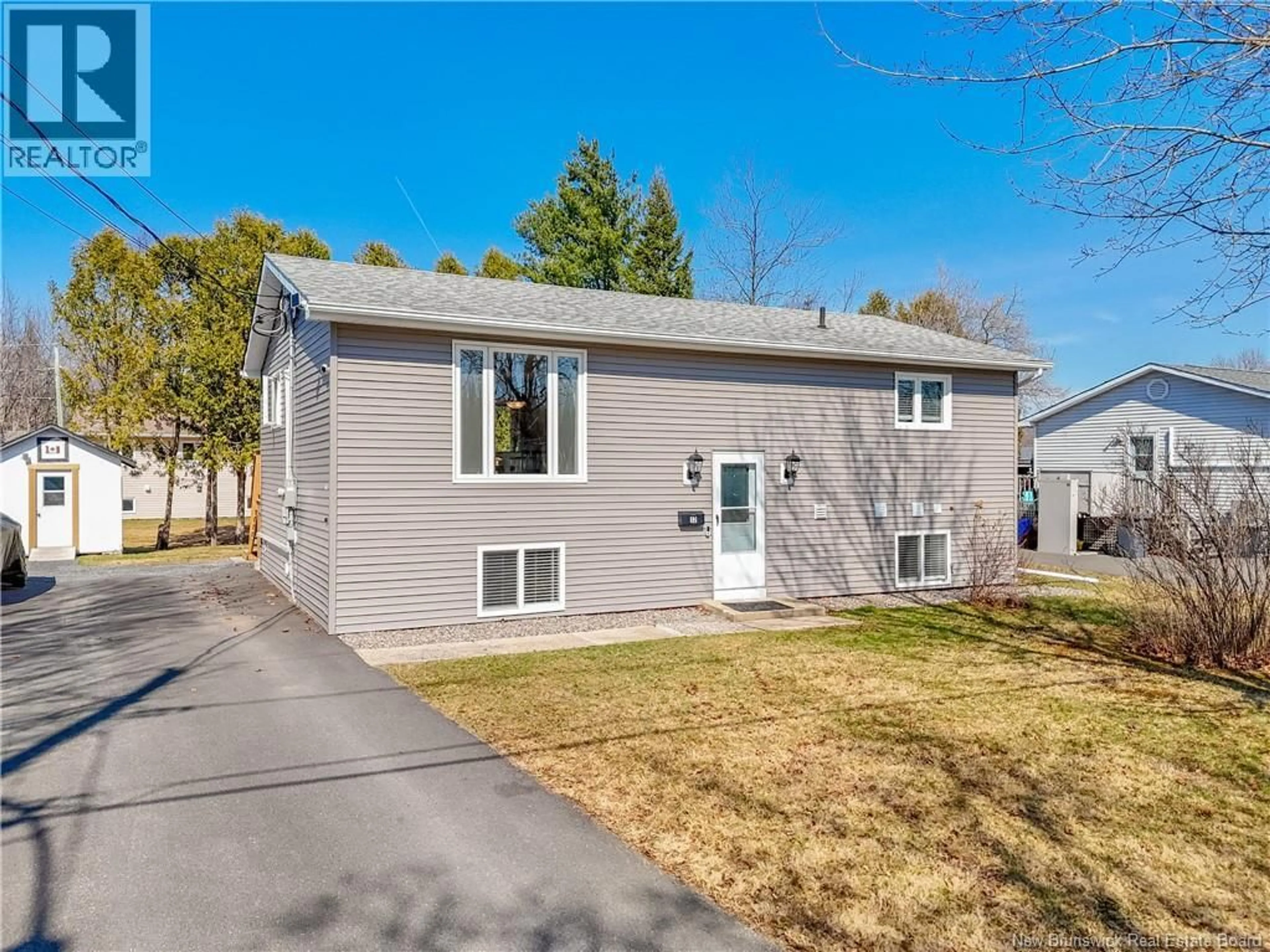 Home with vinyl exterior material, street for 12 LAPOINTE STREET, Fredericton New Brunswick E3A4Y5