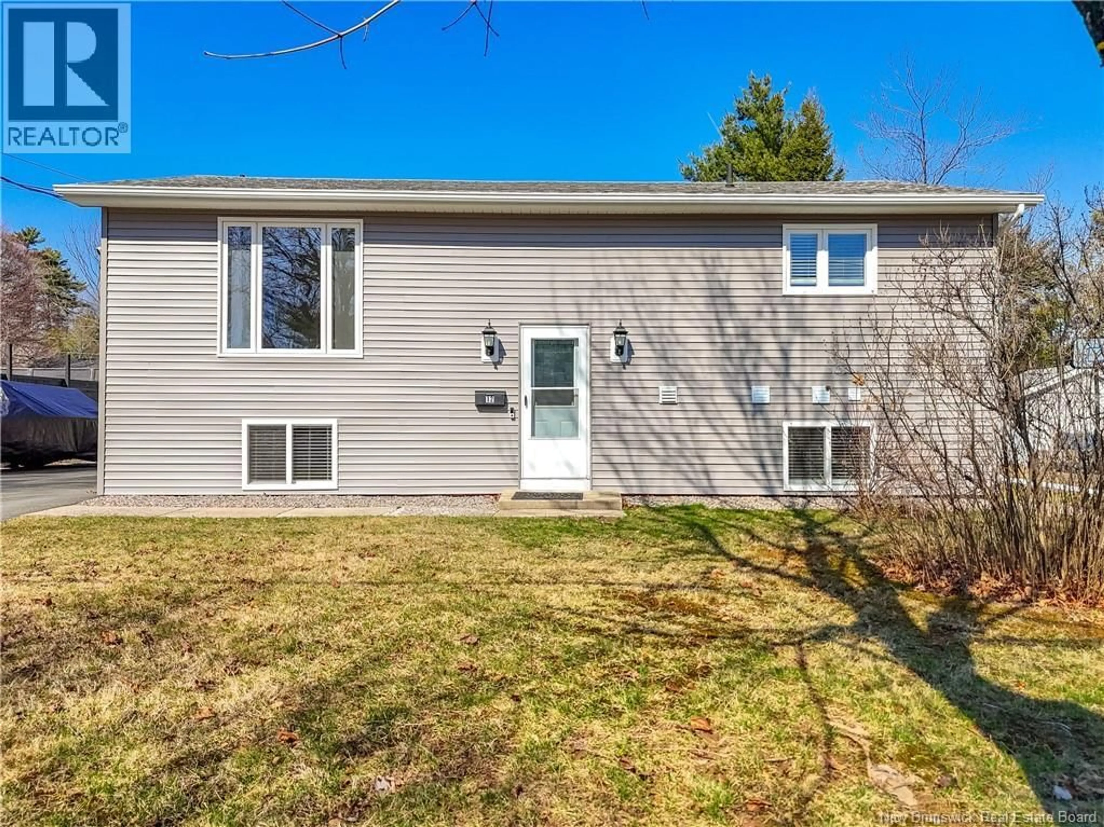 Home with vinyl exterior material, street for 12 LAPOINTE STREET, Fredericton New Brunswick E3A4Y5