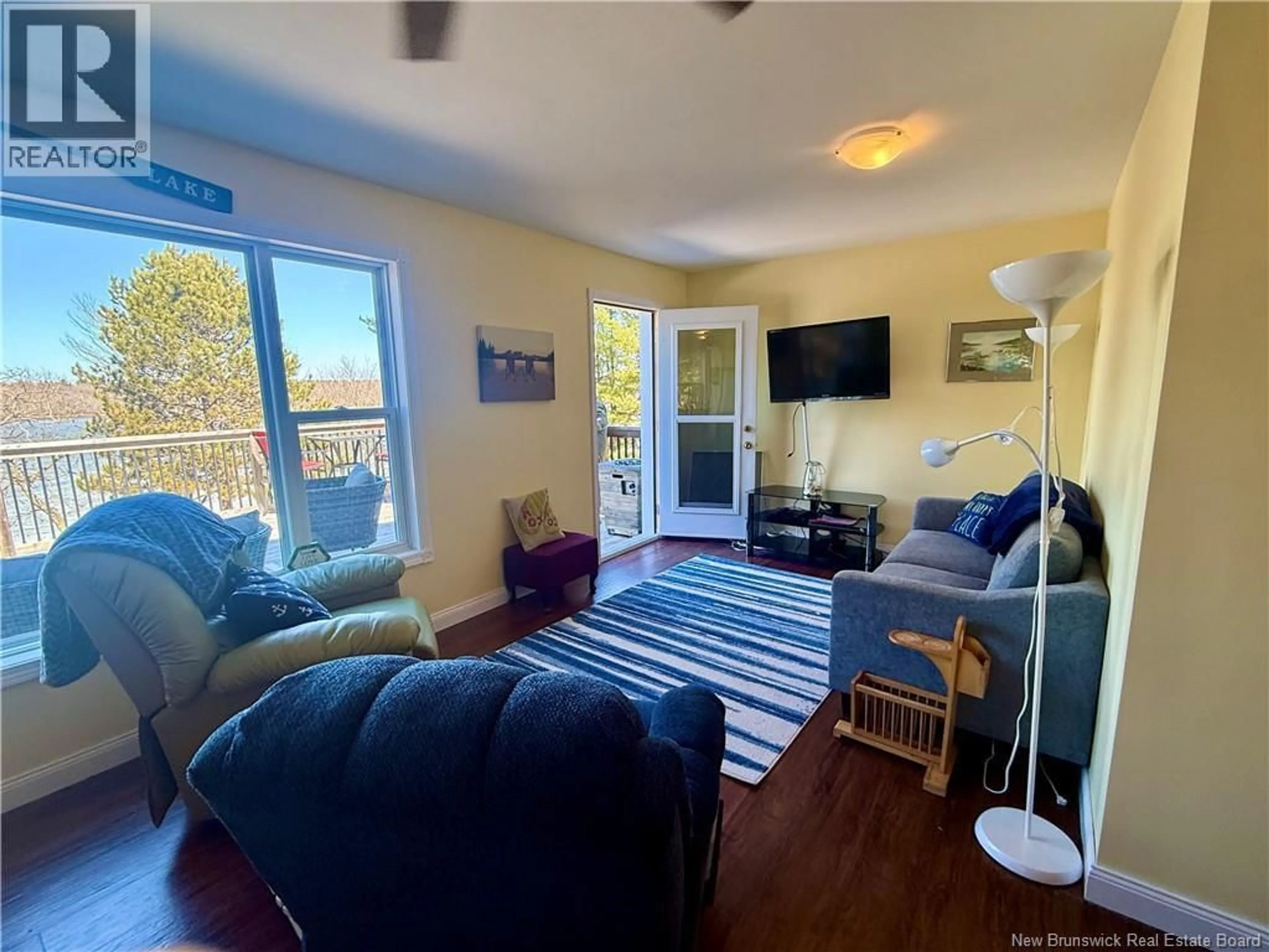 Living room with furniture, unknown for 6 PINE TREE LANE, Youngs Cove New Brunswick E4C2M6