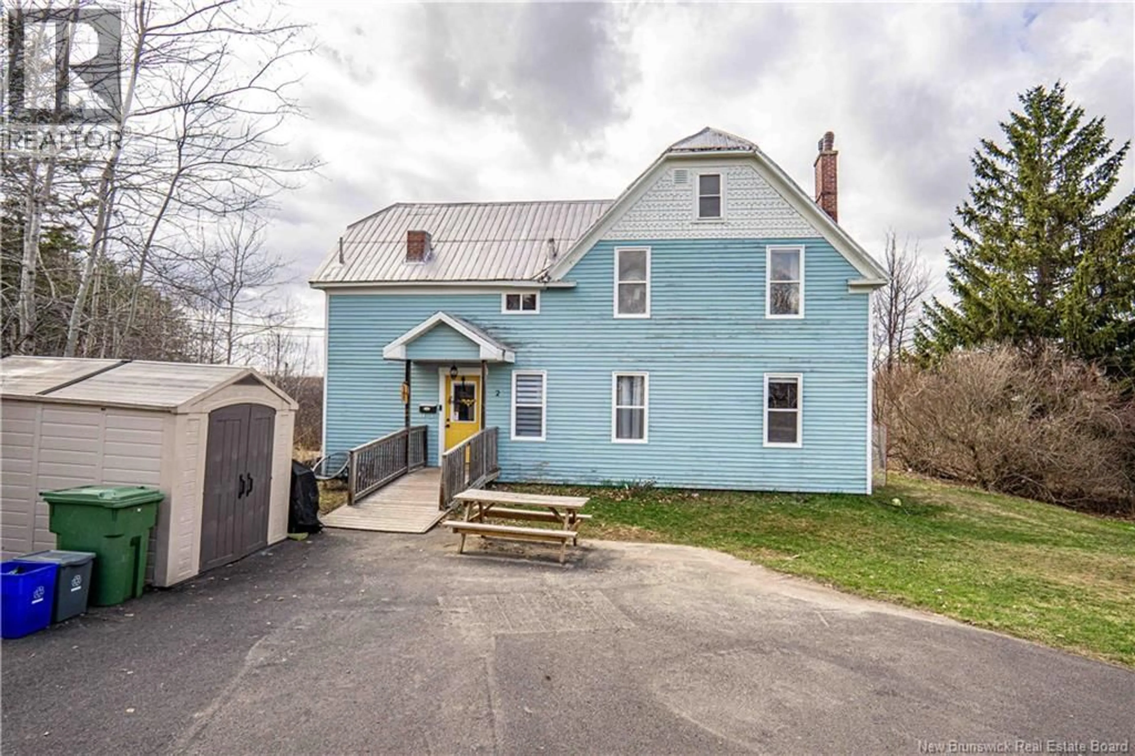 A pic from outside/outdoor area/front of a property/back of a property/a pic from drone, street for 2 MILLS STREET, Oromocto New Brunswick E2V2N3