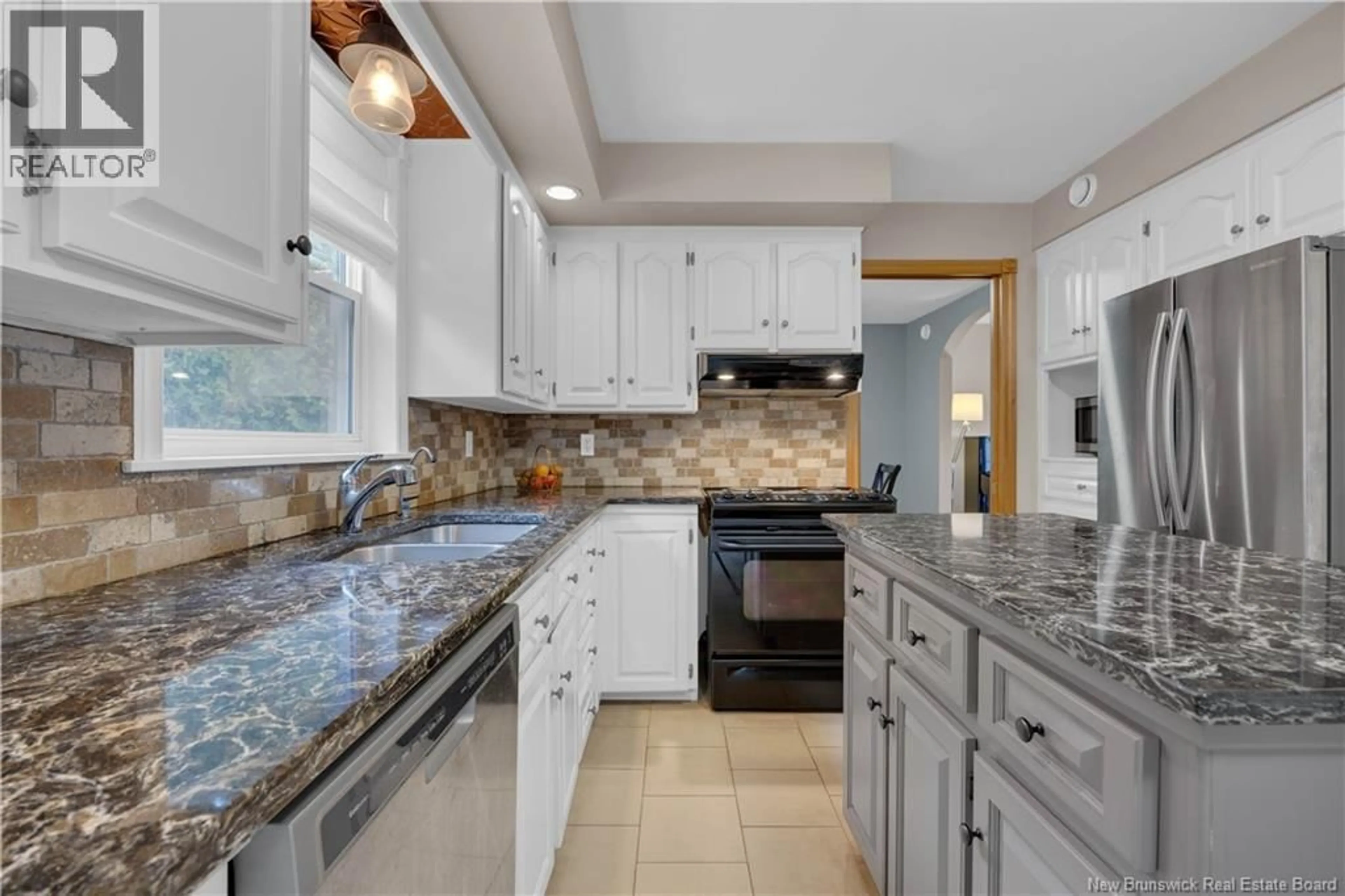 Open concept kitchen, ceramic/tile floor for 16 AMELIA COURT, Saint John New Brunswick E2K5M3
