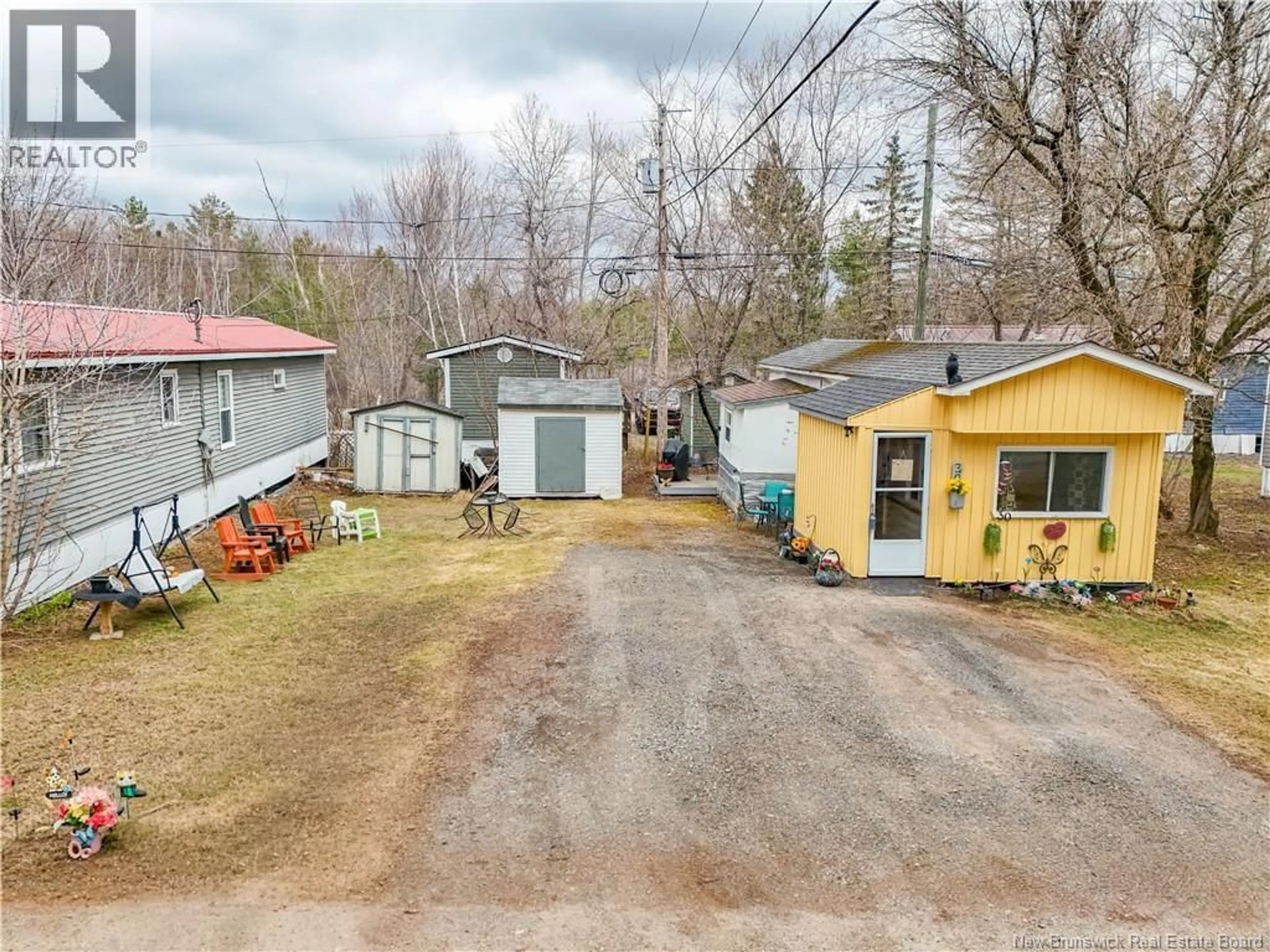 A pic from outside/outdoor area/front of a property/back of a property/a pic from drone, street for 30 NEEDLE COURT, Fredericton New Brunswick E3A6R7