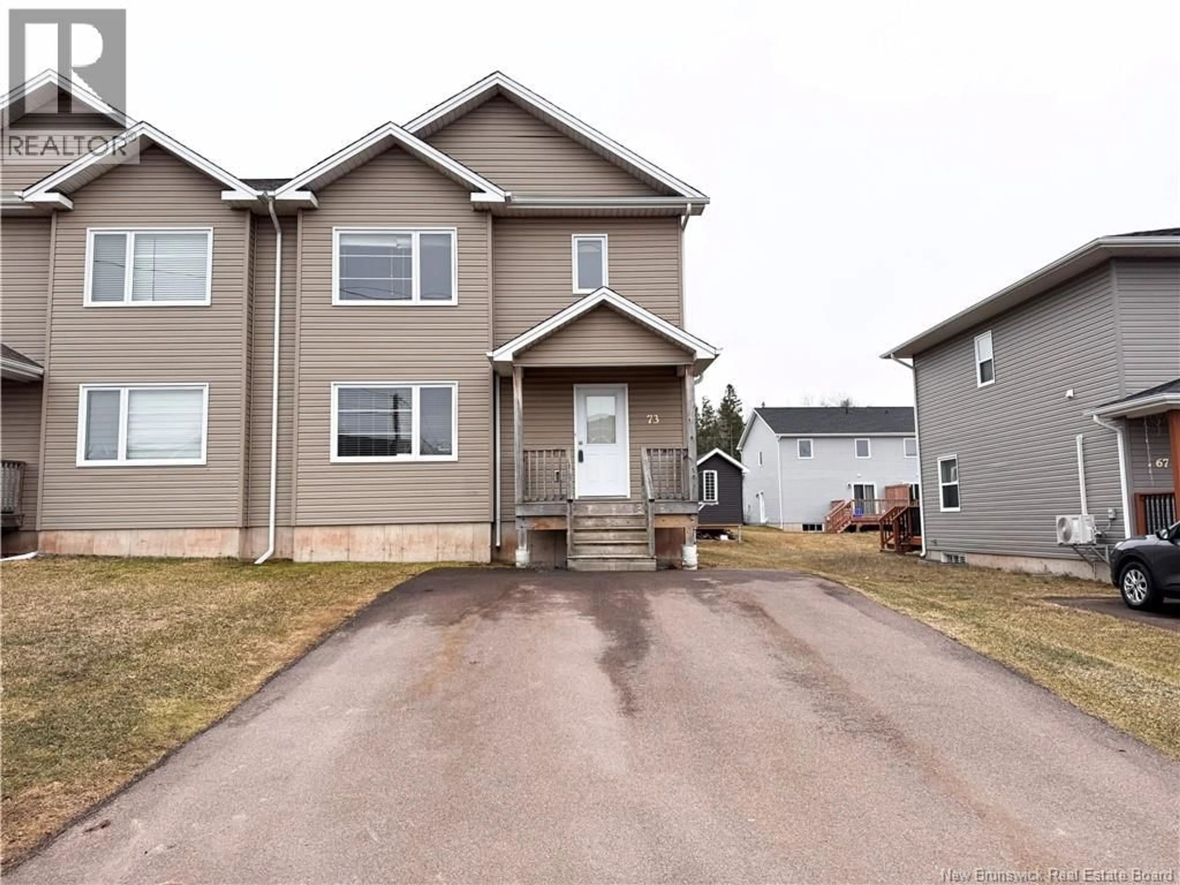 Home with vinyl exterior material, street for 73 DES PEUPLIERS, Dieppe New Brunswick E1A9E4