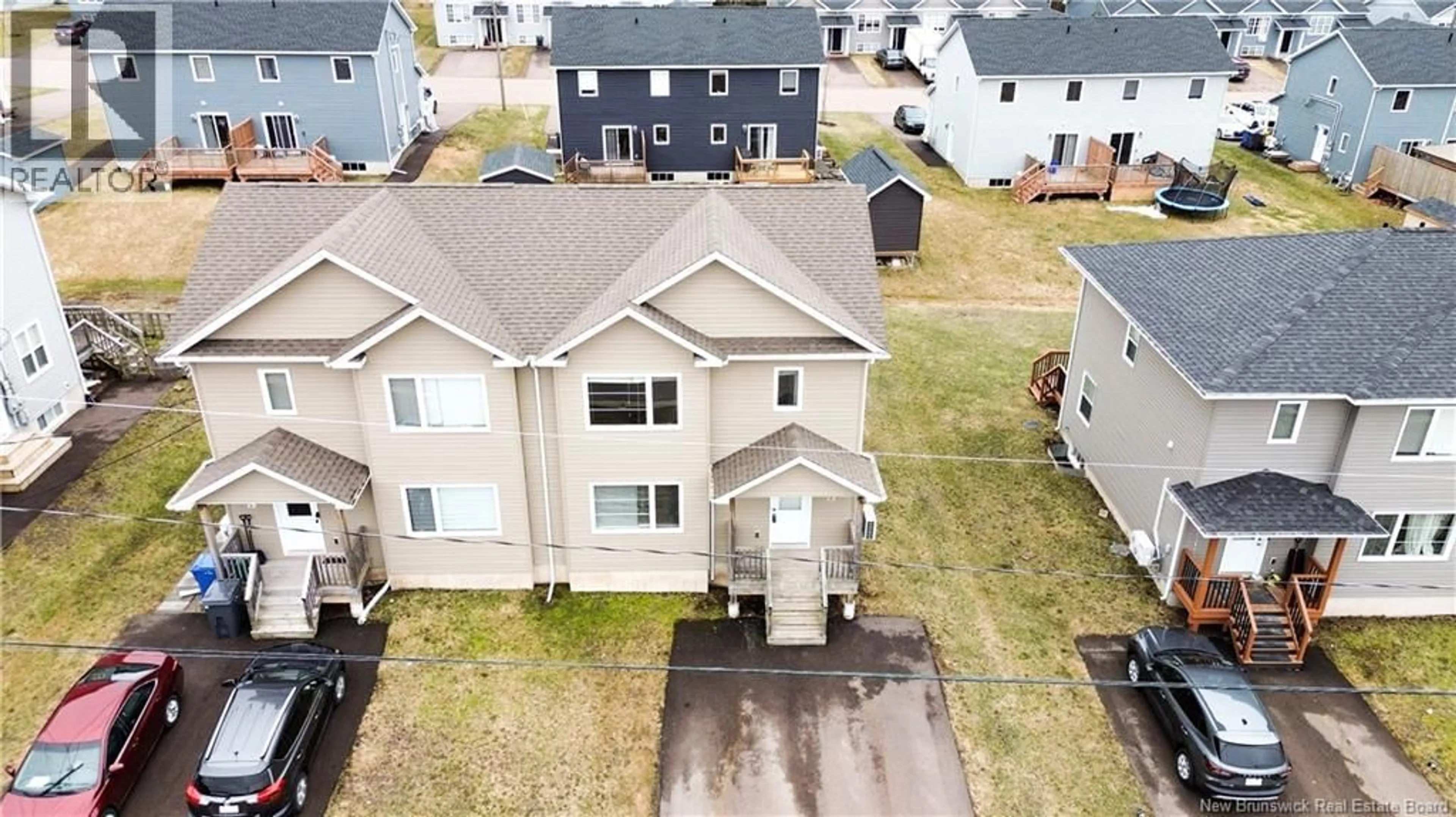 A pic from outside/outdoor area/front of a property/back of a property/a pic from drone, street for 73 DES PEUPLIERS, Dieppe New Brunswick E1A9E4