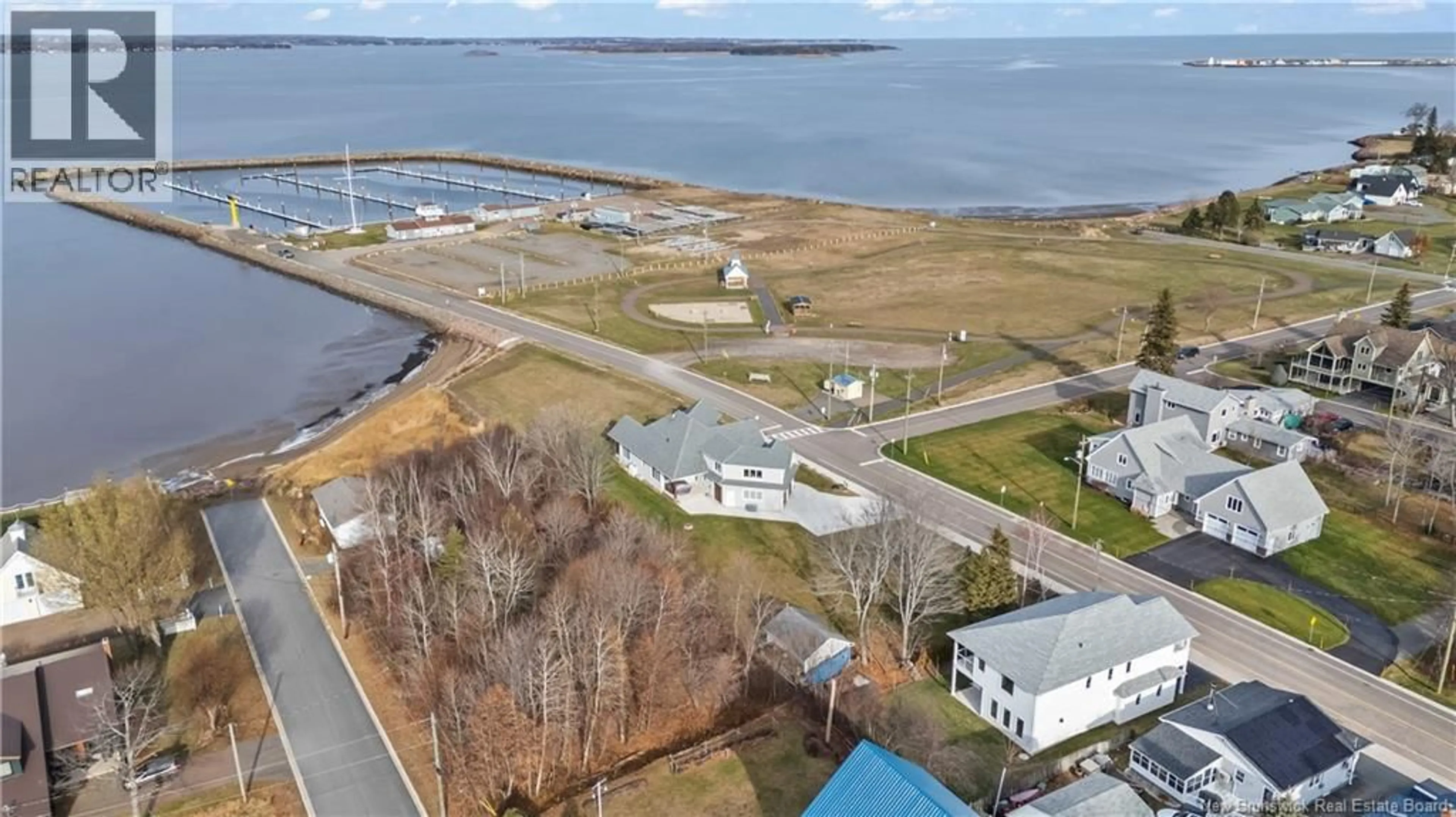A pic from outside/outdoor area/front of a property/back of a property/a pic from drone, water/lake/river/ocean view for 133 PLEASANT STREET, Shediac New Brunswick E4P2L4