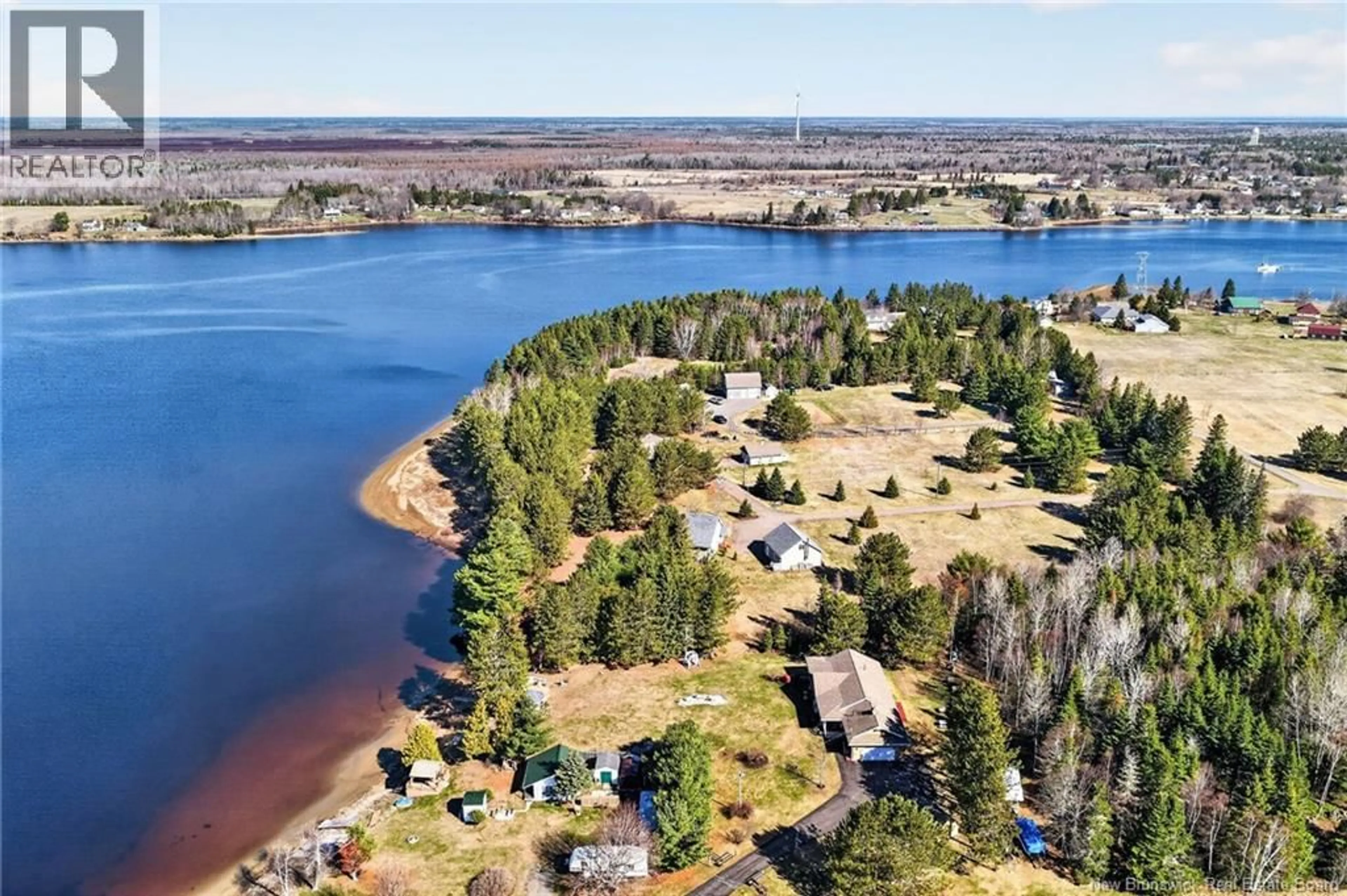 A pic from outside/outdoor area/front of a property/back of a property/a pic from drone, water/lake/river/ocean view for 24 NORMANDIE COURT, Rexton New Brunswick E4W2C2