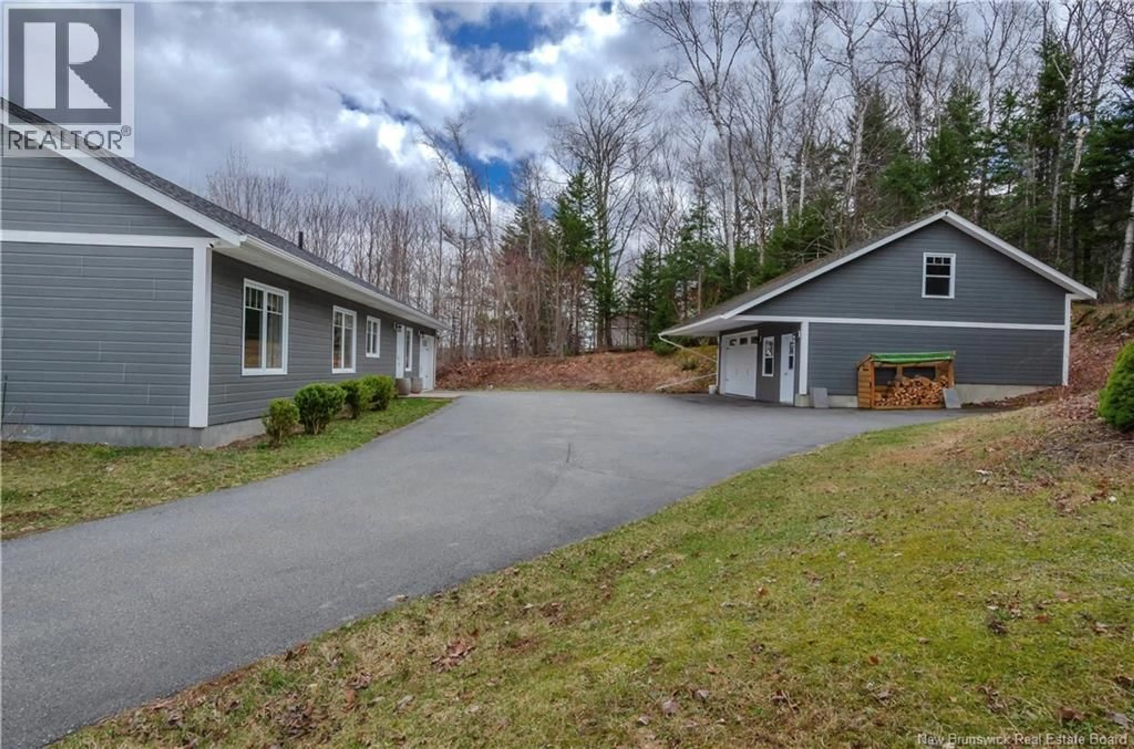 A pic from outside/outdoor area/front of a property/back of a property/a pic from drone, street for 1 CHESTNUT DRIVE, Grand Bay-Westfield New Brunswick E5K3M1