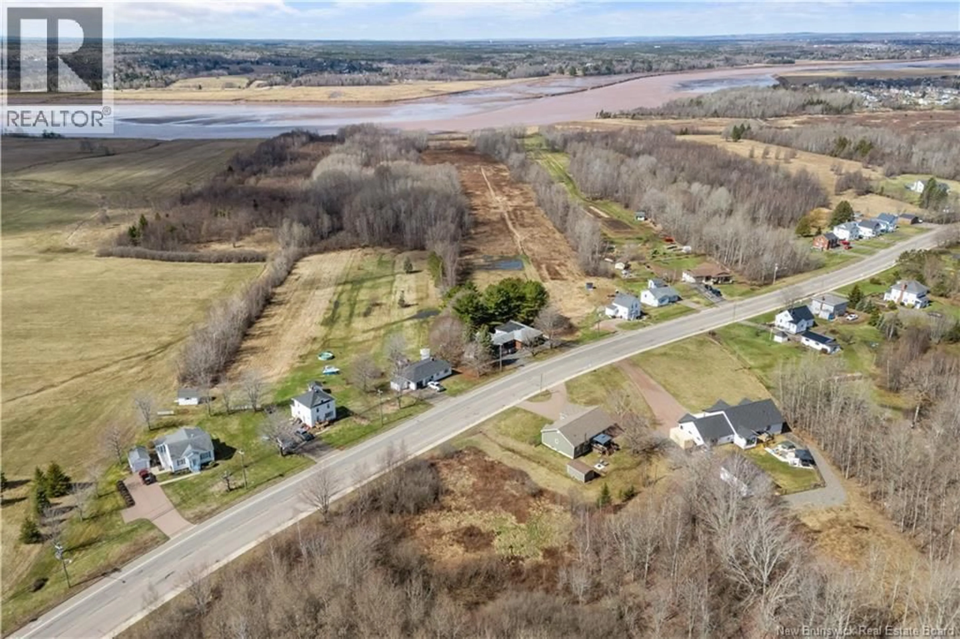 A pic from outside/outdoor area/front of a property/back of a property/a pic from drone, water/lake/river/ocean view for 2040 AMIRAULT STREET, Dieppe New Brunswick E1A7K1