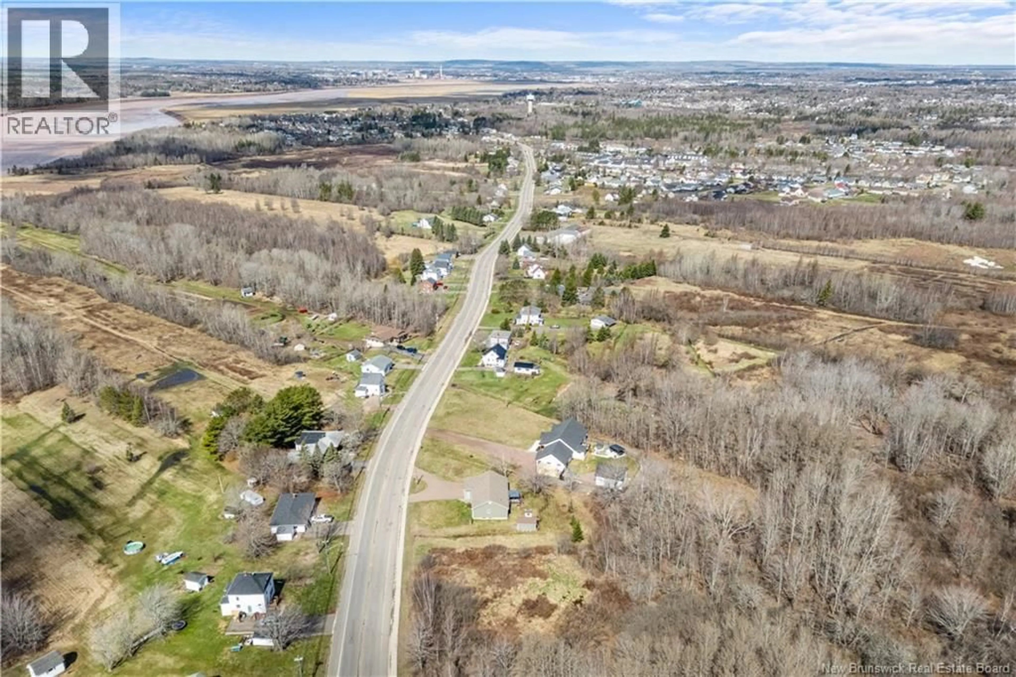 A pic from outside/outdoor area/front of a property/back of a property/a pic from drone, street for 2040 AMIRAULT STREET, Dieppe New Brunswick E1A7K1