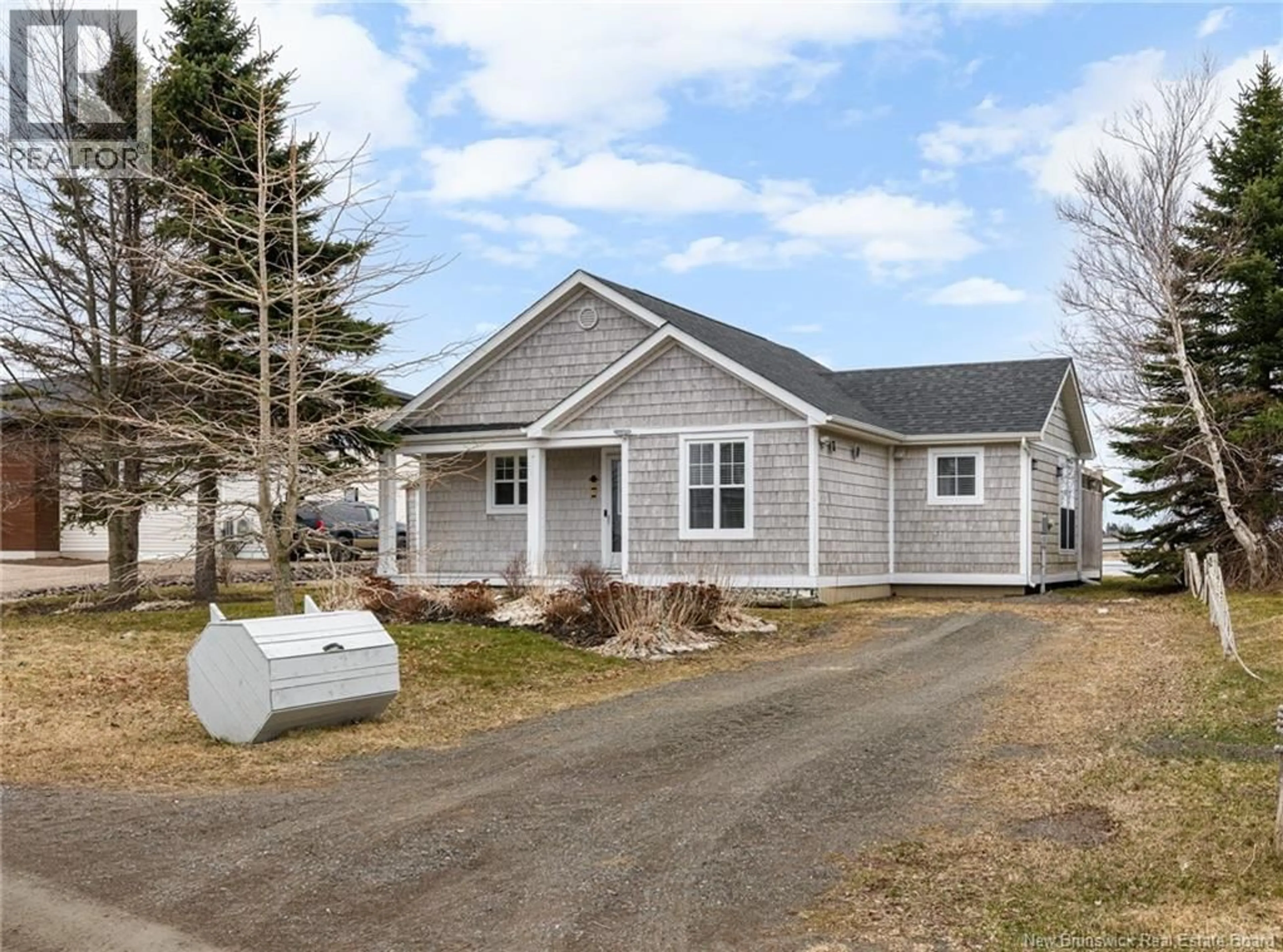 Home with vinyl exterior material, street for 54 ACADIE STREET, Cocagne New Brunswick E4R5Y6