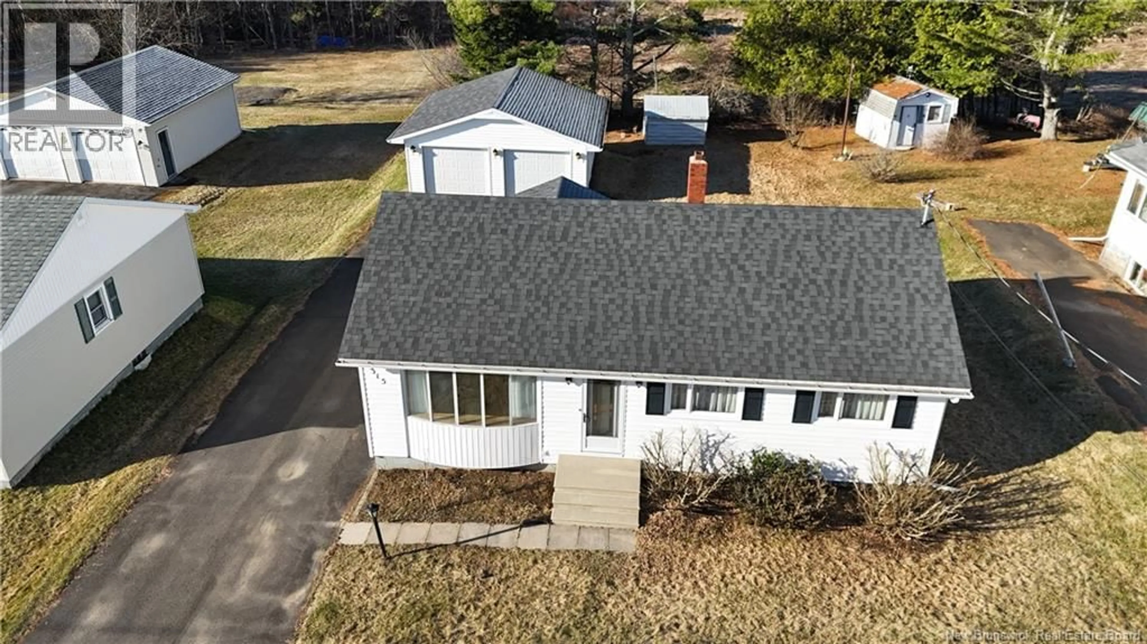 A pic from outside/outdoor area/front of a property/back of a property/a pic from drone, street for 315 ROYAL ROAD, Fredericton New Brunswick E3A6M1