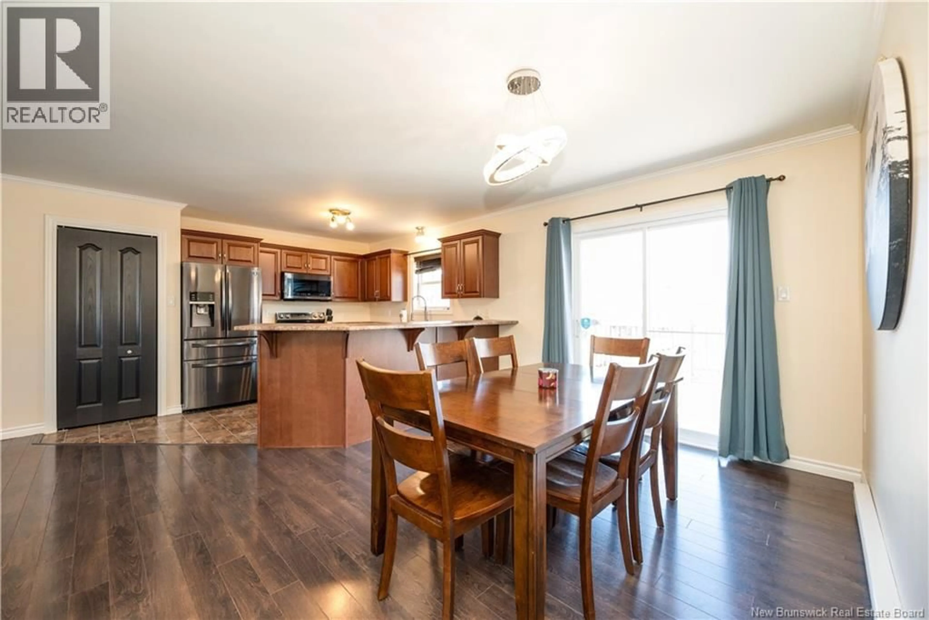 Open concept kitchen, wood/laminate floor for 28 CROWBUSH CRESCENT, Moncton New Brunswick E1G0G9