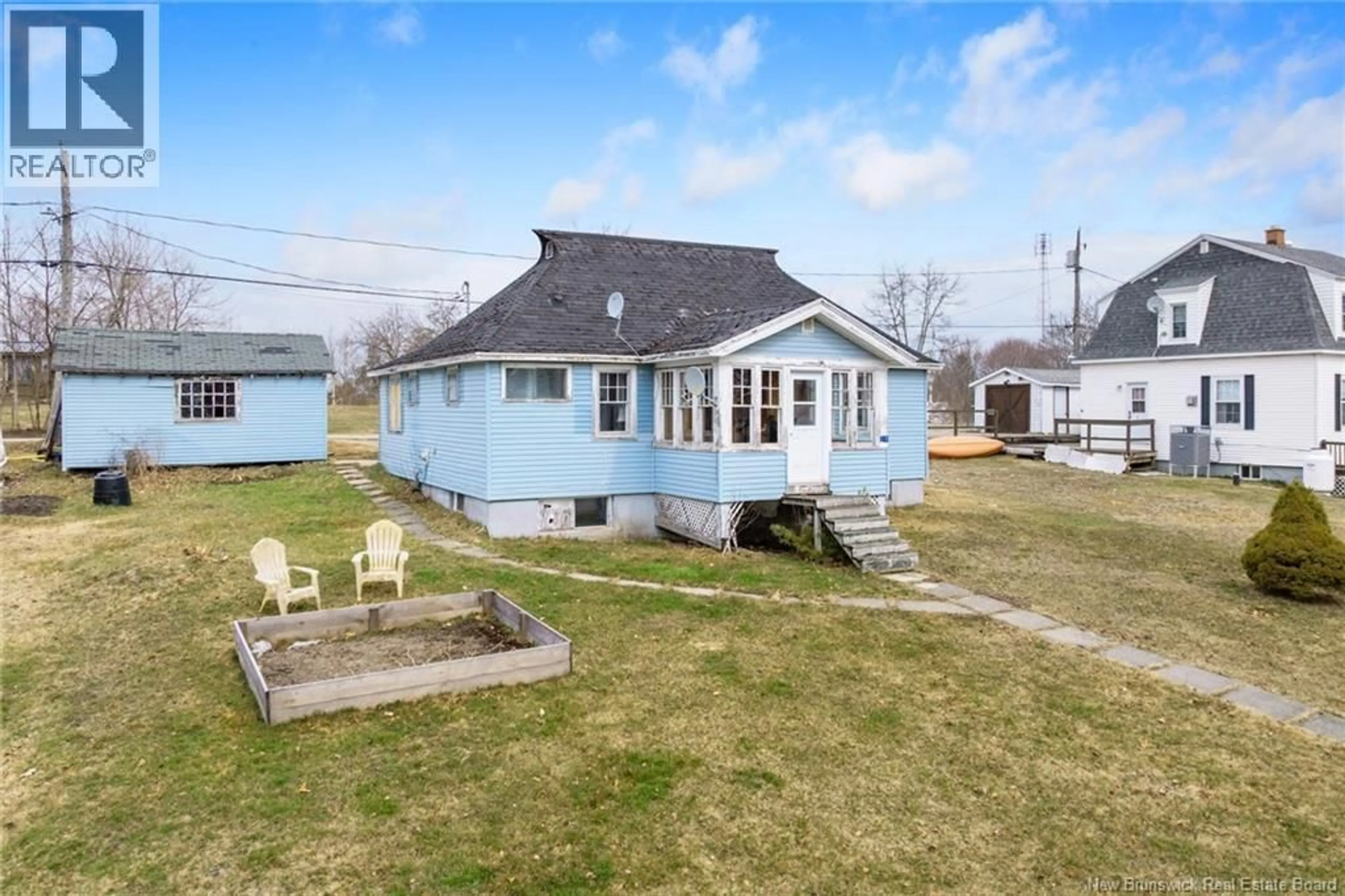 A pic from outside/outdoor area/front of a property/back of a property/a pic from drone, unknown for 19 ROCKLAND DRIVE, McAdam New Brunswick E6J1V3