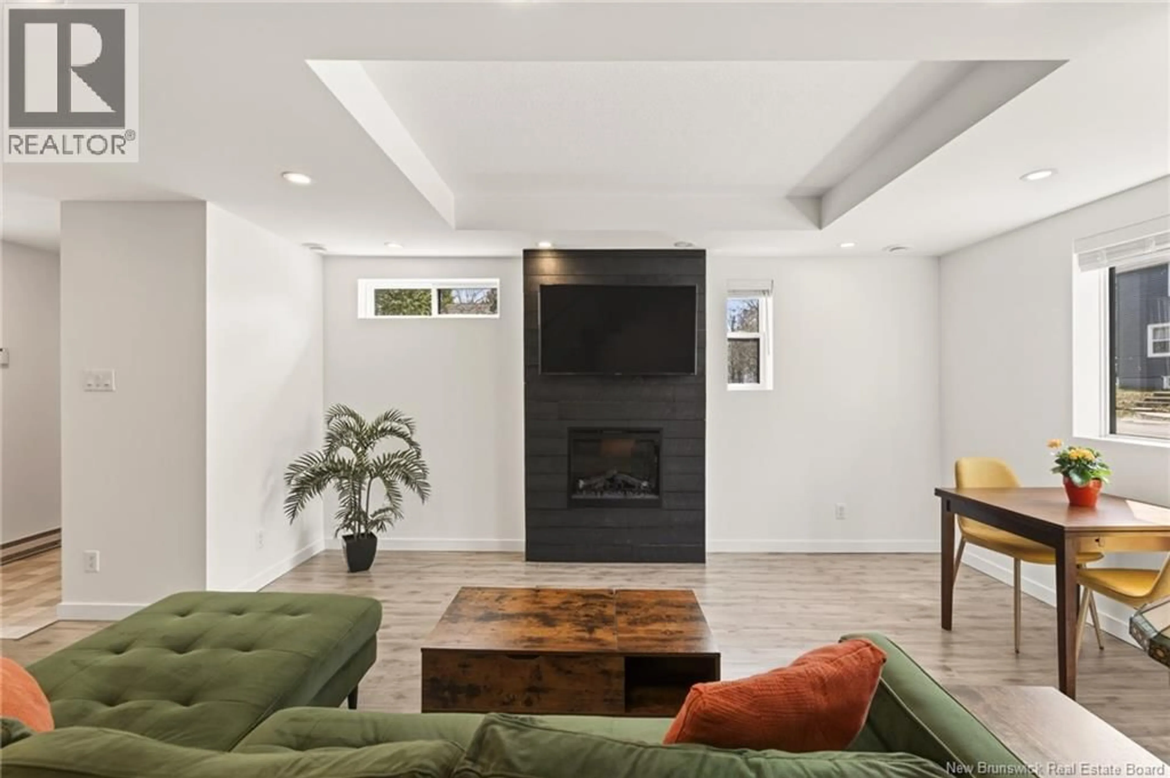Living room with furniture, ceramic/tile floor for 159 NORTH STREET, Moncton New Brunswick E1C5X9